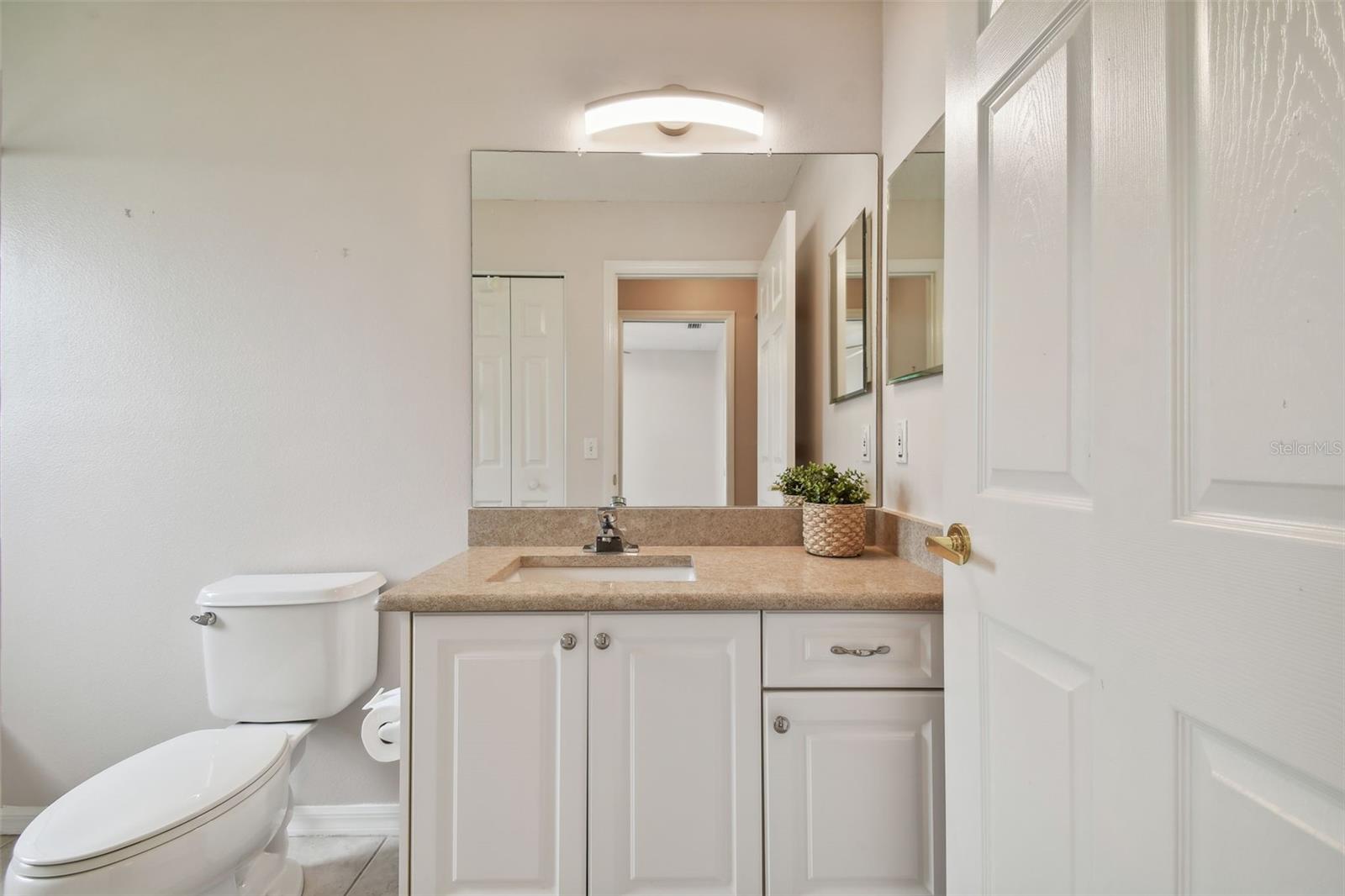 quartz counters in the guest bathroom