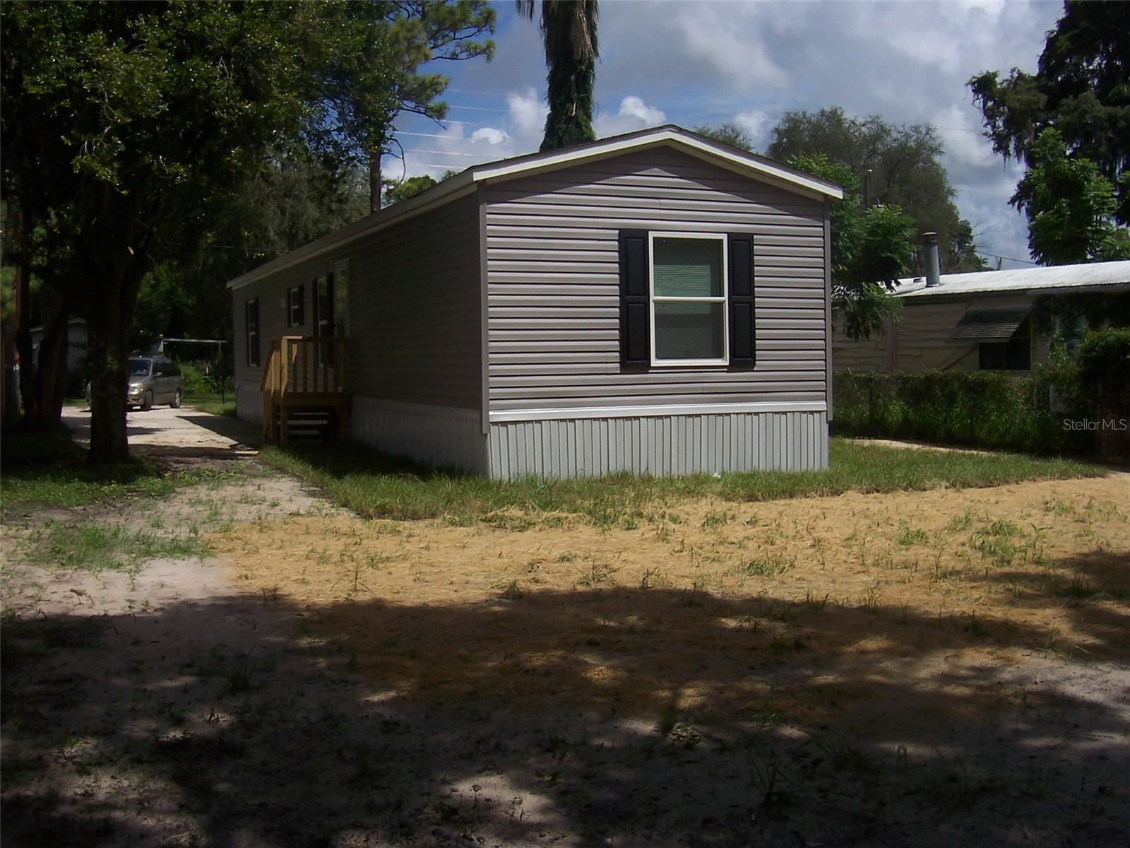 Back of home.  Septic is located towards the back of home.