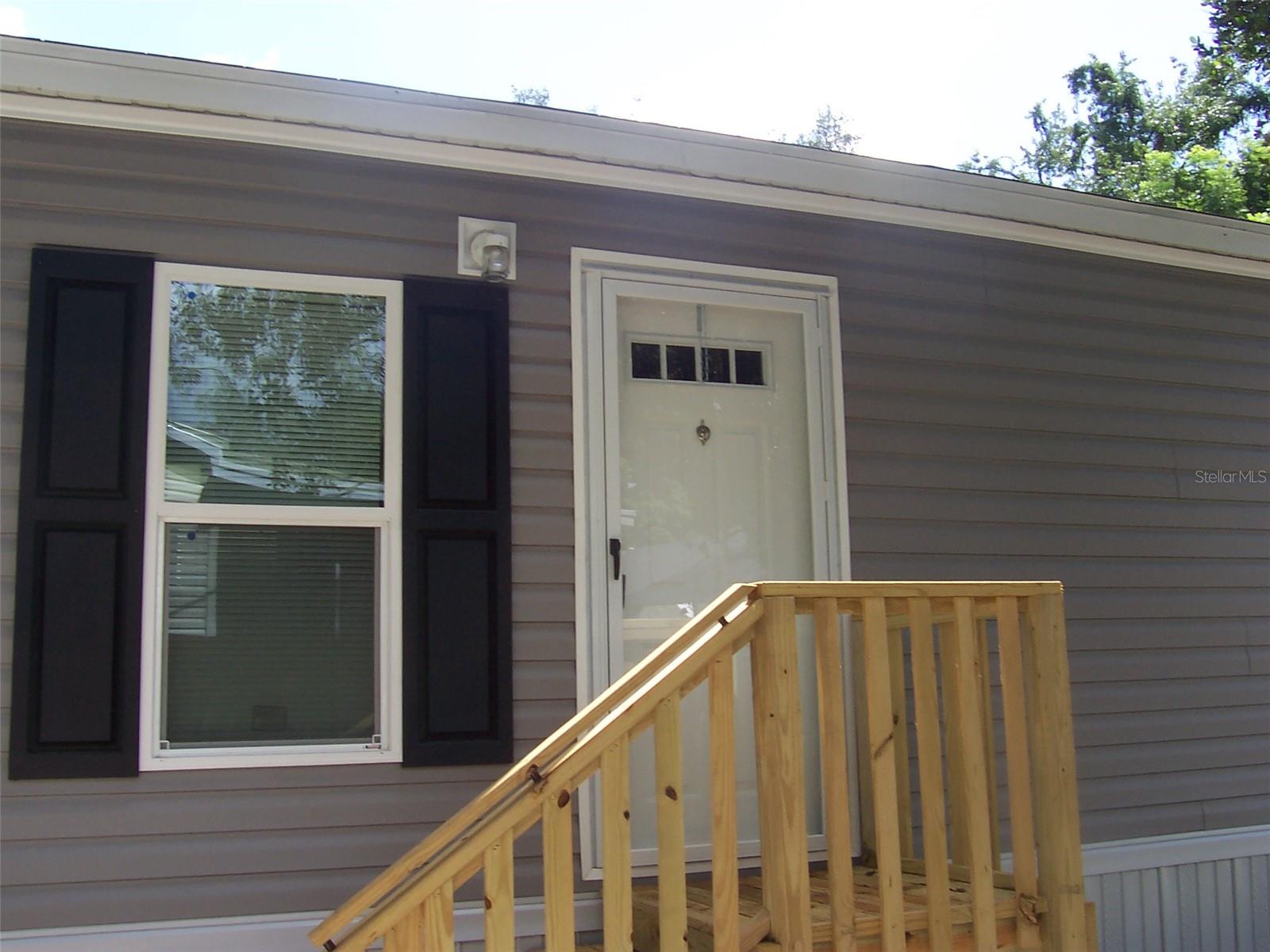 Front Entry way that says welcome home!