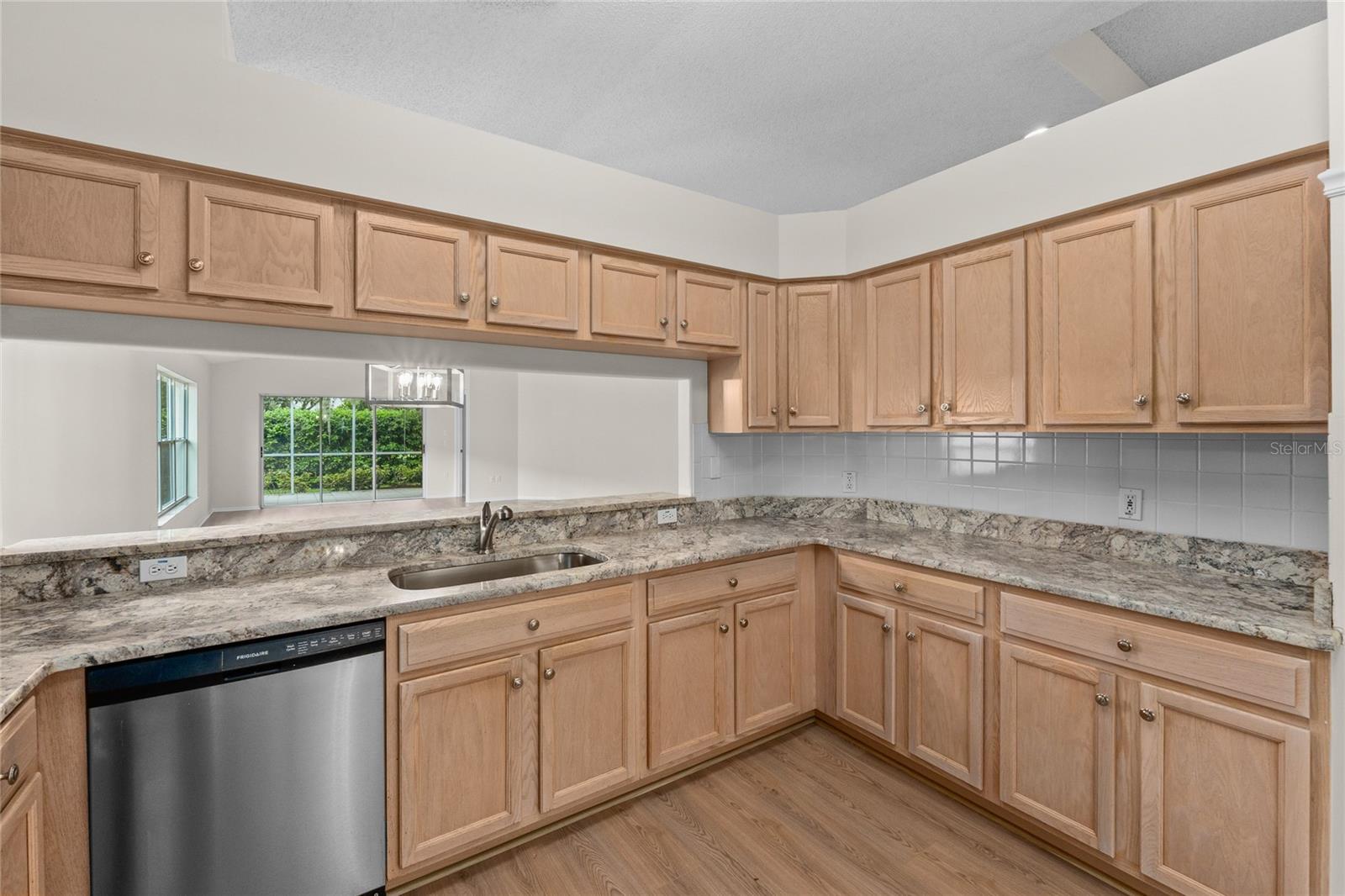 The Kitchen opens to the Dining/Living Room area