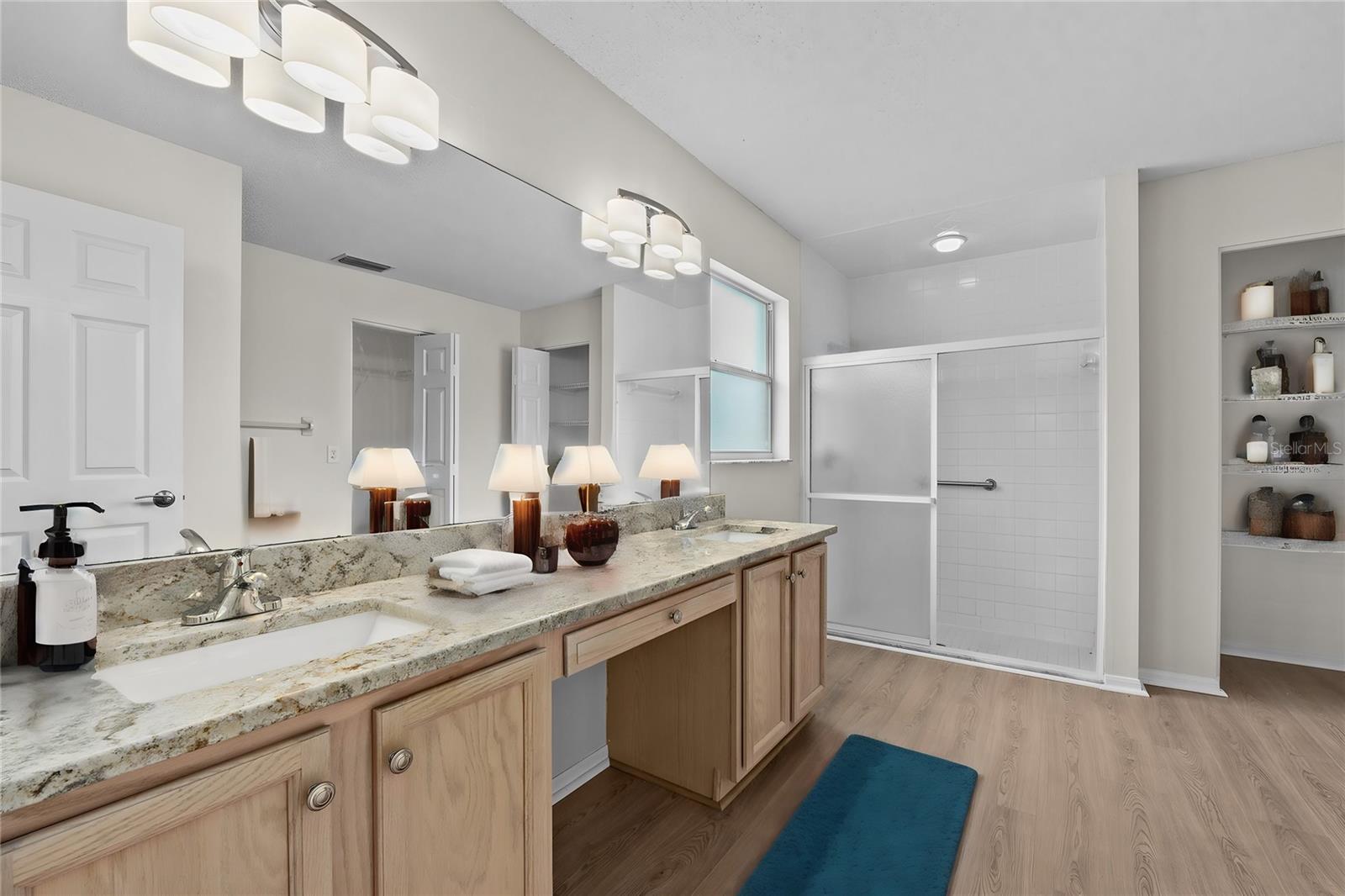 Master Bathroom with double vanity, large shower and HUGE closet.