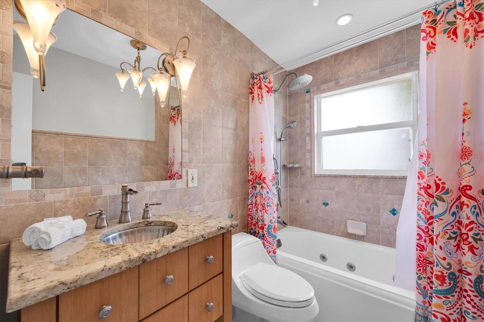 Guest bath with jacuzzi tub