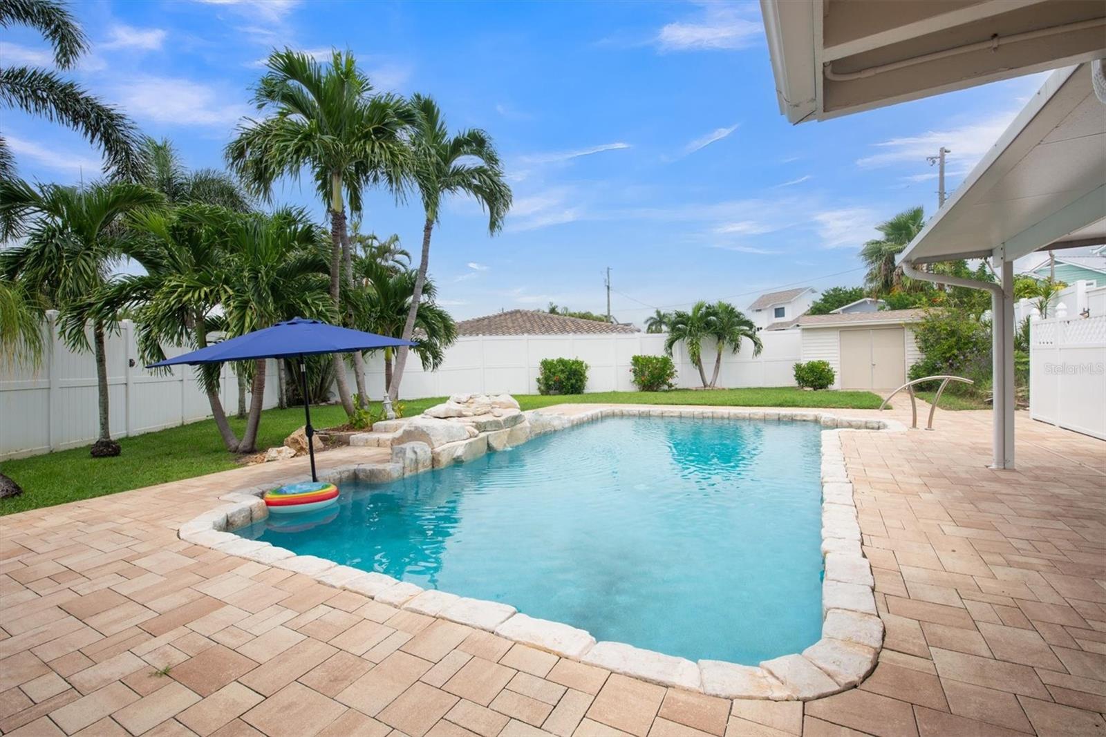 Lush backyard with salt water pool