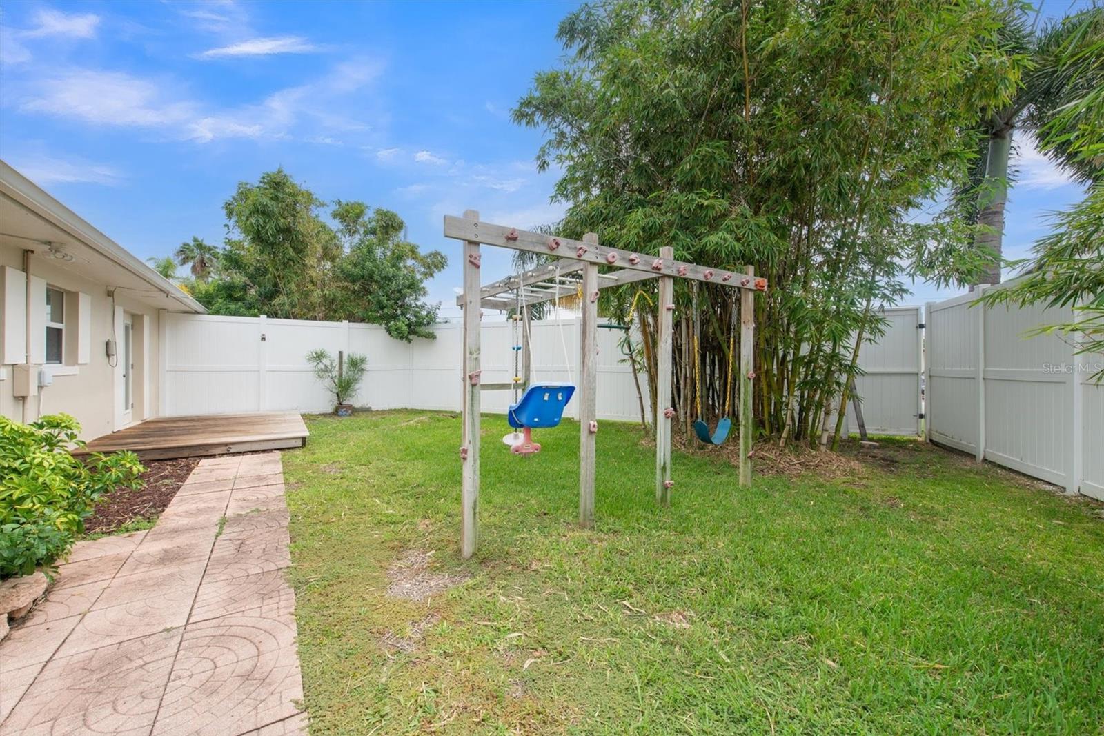 Jungle gym located in the side yard