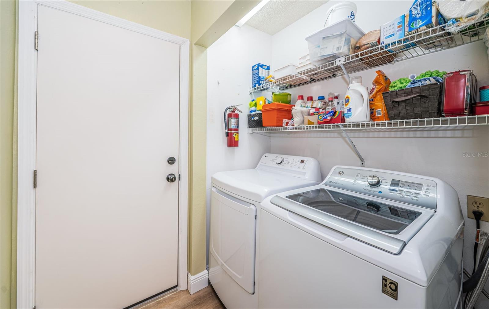 Laundry closet off kitchen - access to the garage