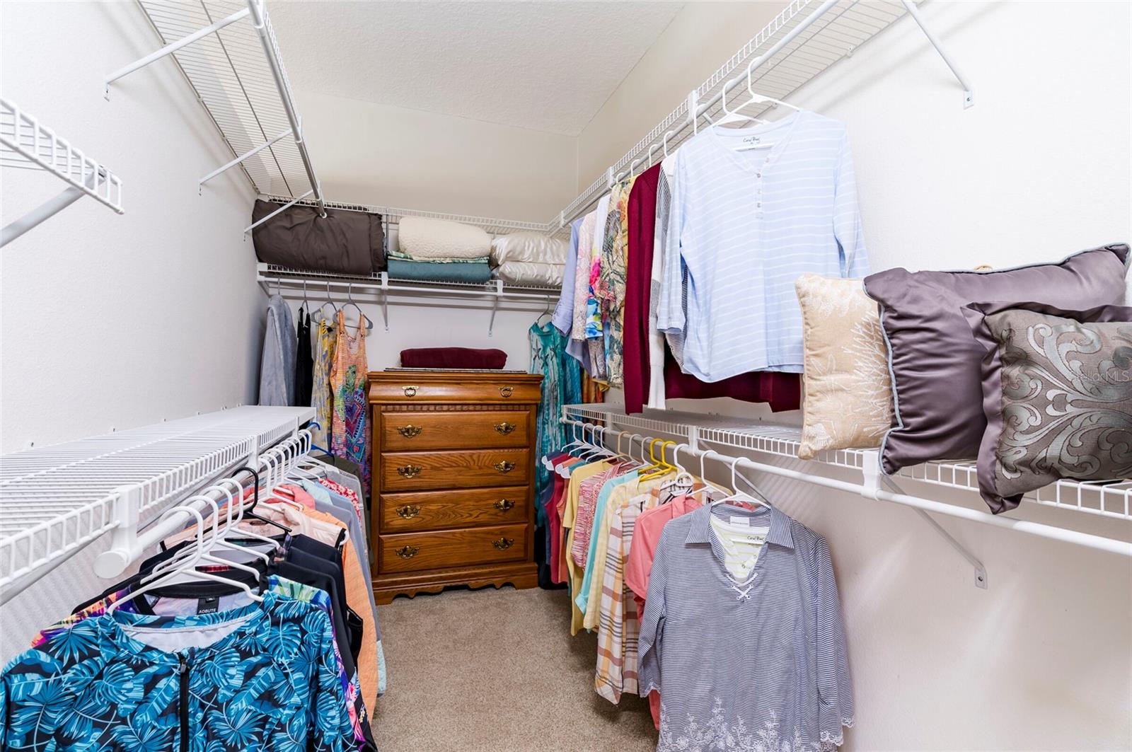 PRIMARY BEDROOM WALK-IN CLOSET