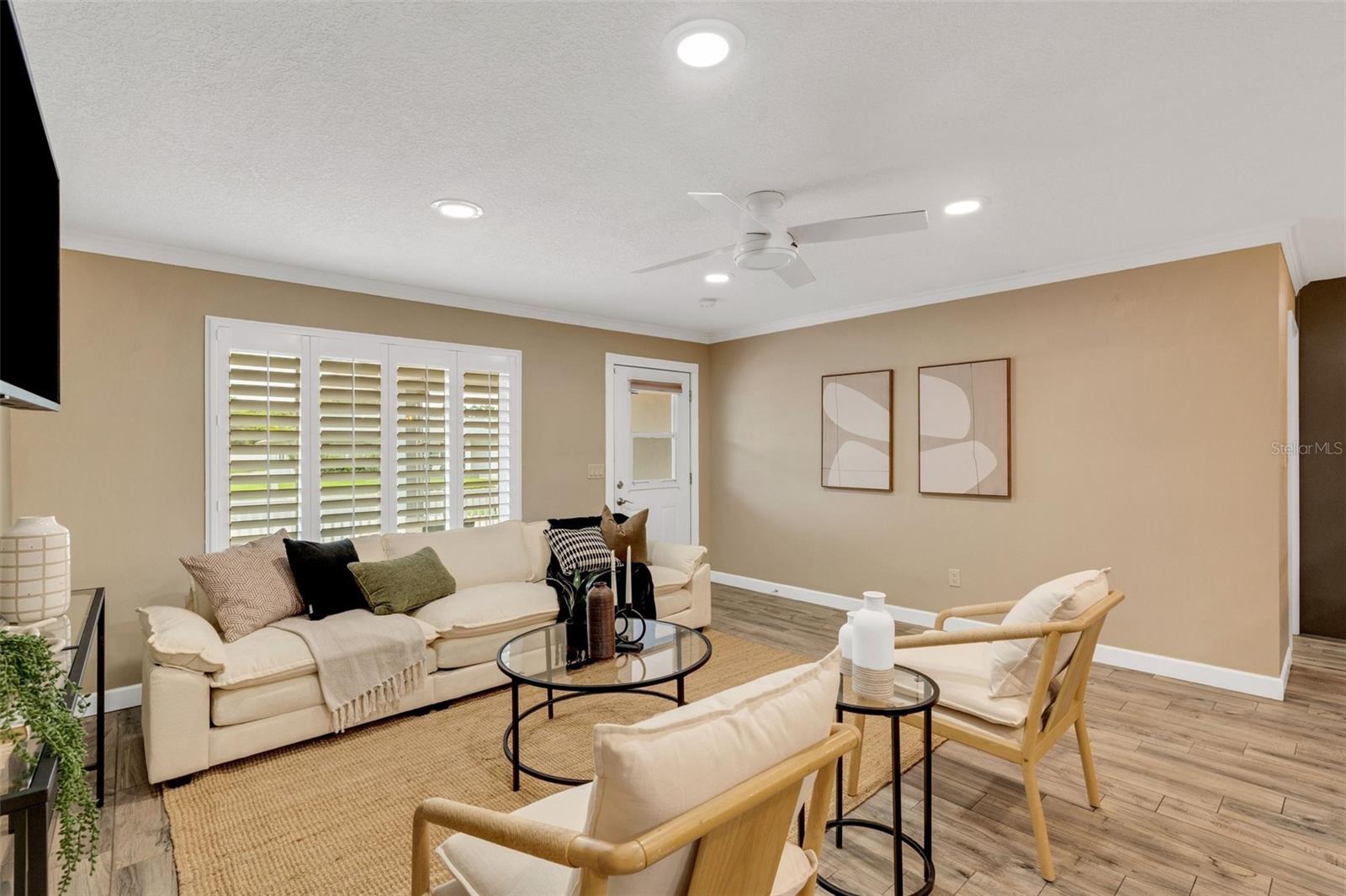 Lovely plantation shutters and recessed lighting~