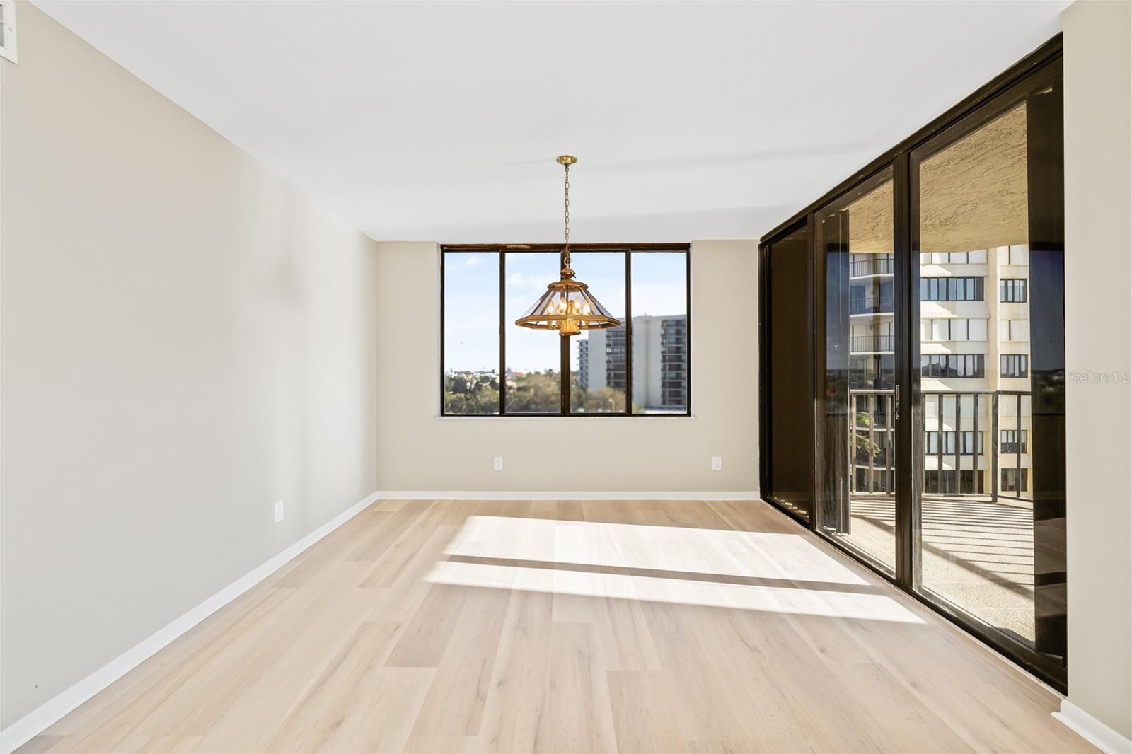 Dining area with access to the patio and views