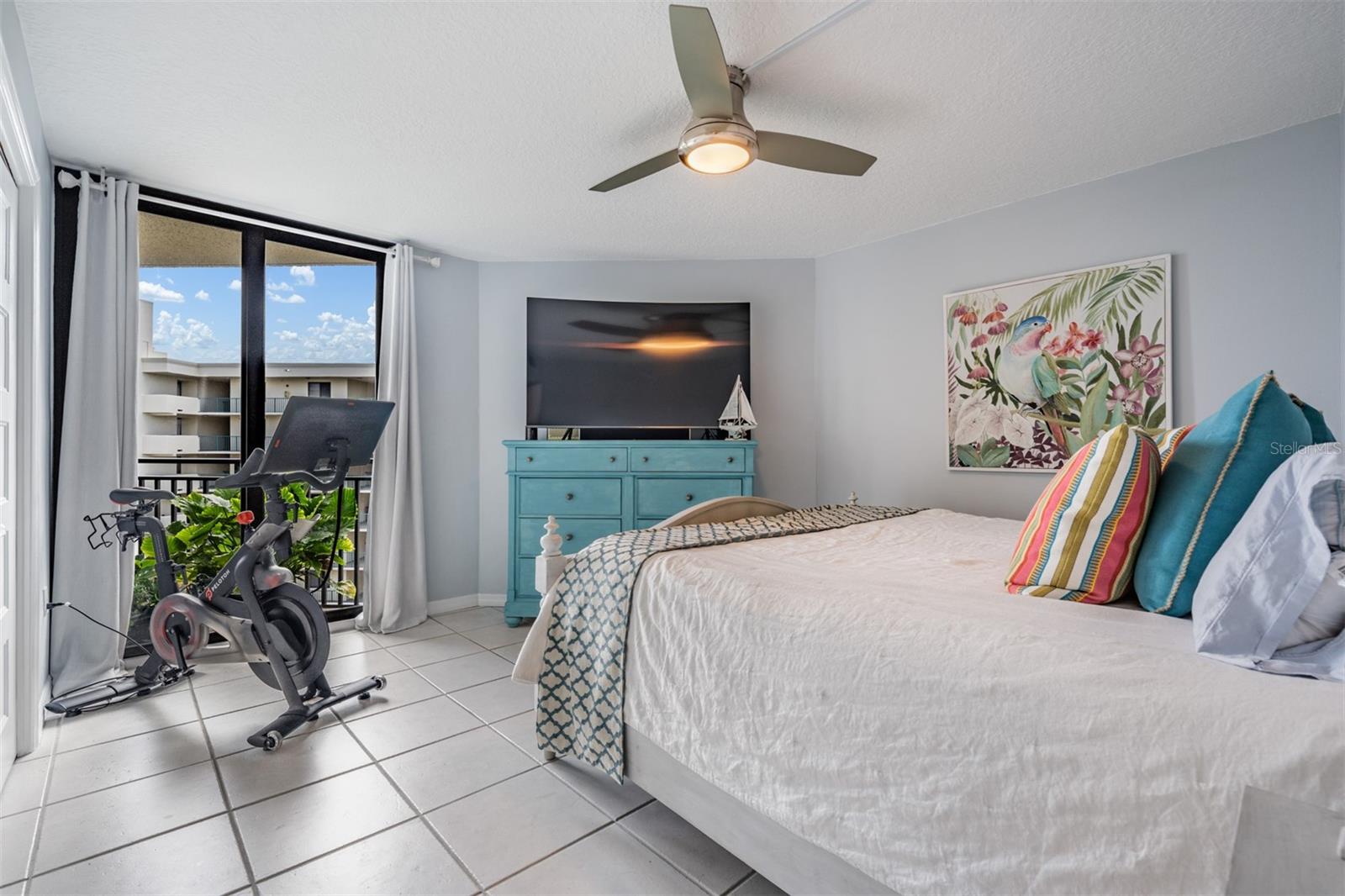 Guest Bedroom with slider out to balcony with view of bay/harbor