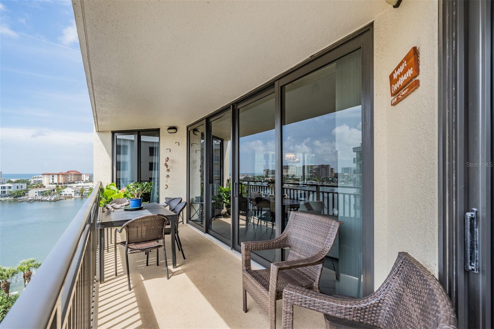 Balcony with views of intercoastal water way to the west and view of bay/harbor to the east.