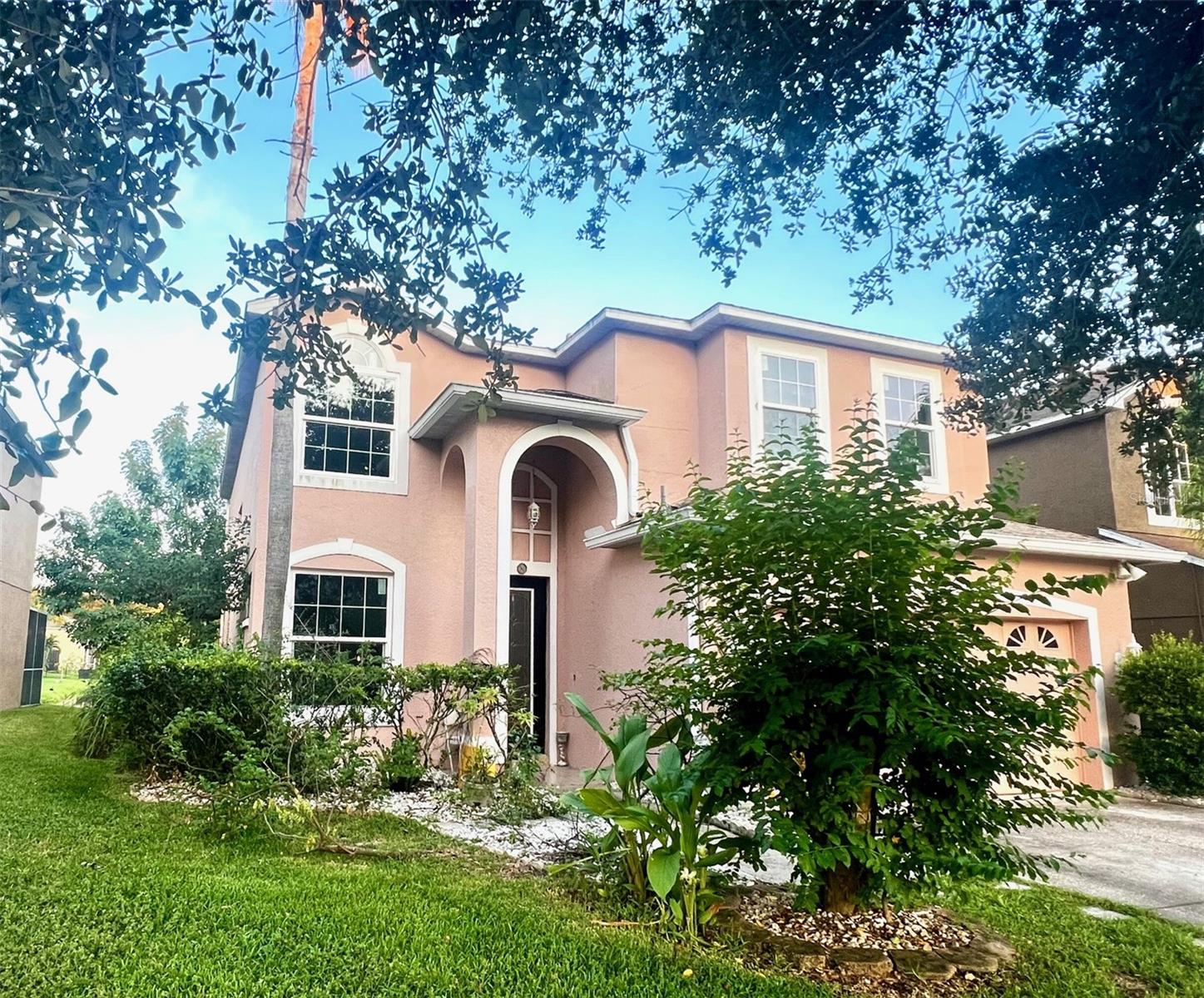 Exterior Front with Pond in back