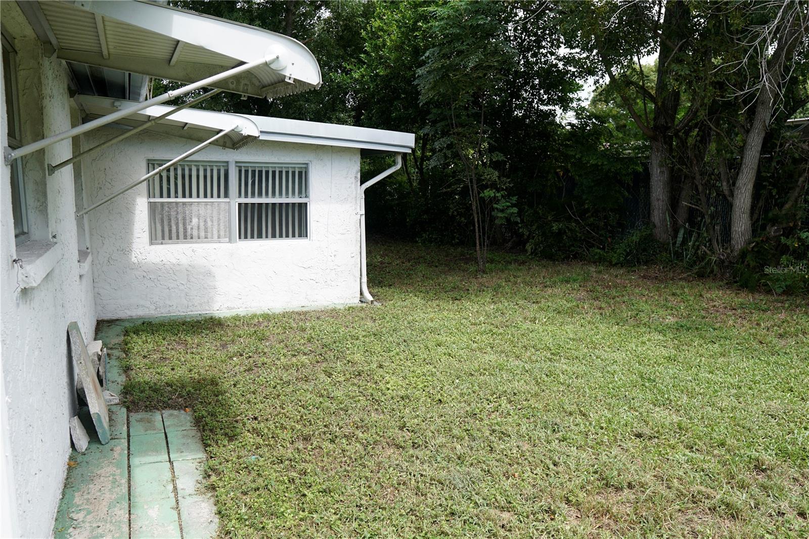 Partly fenced rear yard