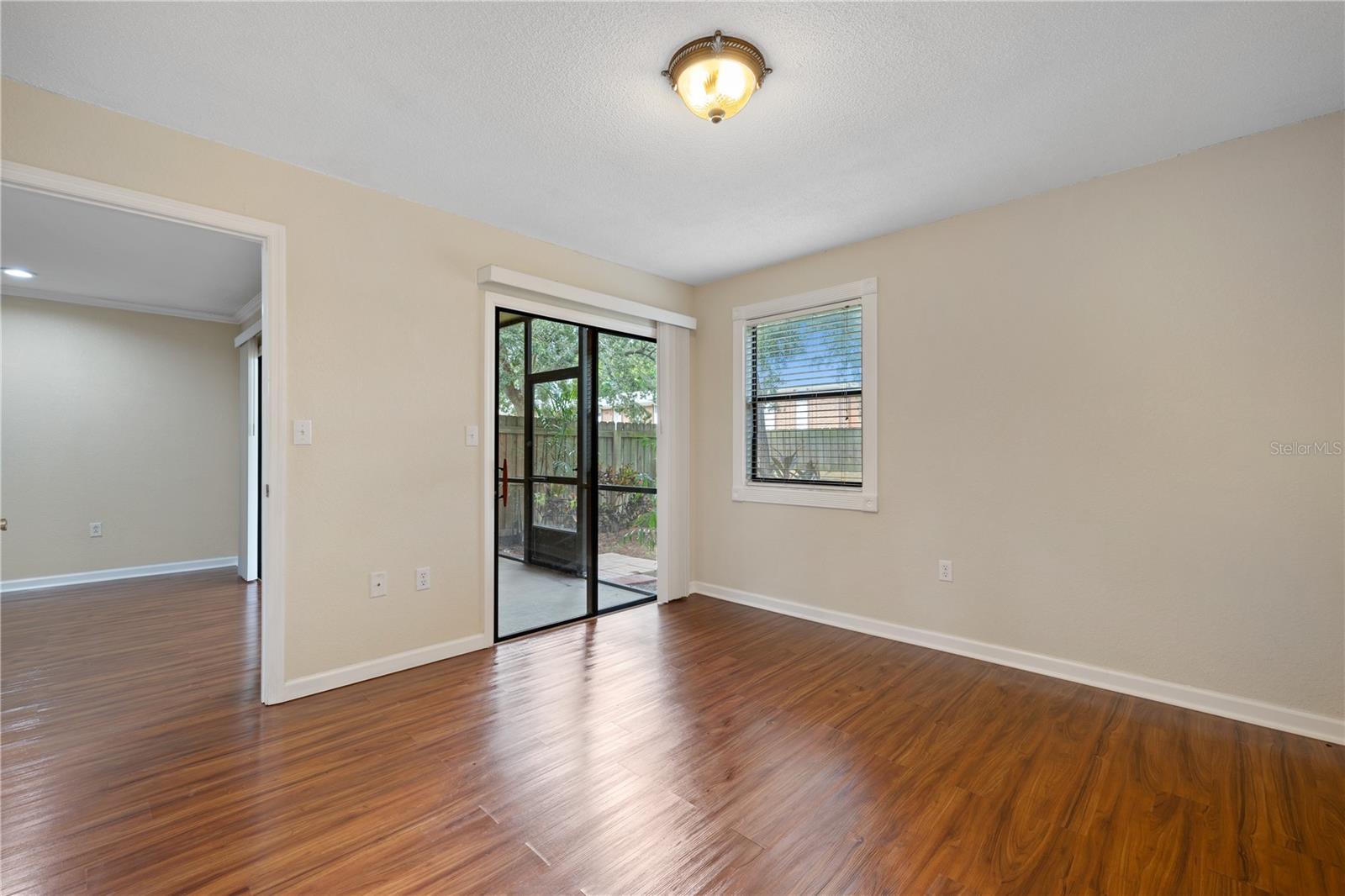 Master leading out to rear screened patio!