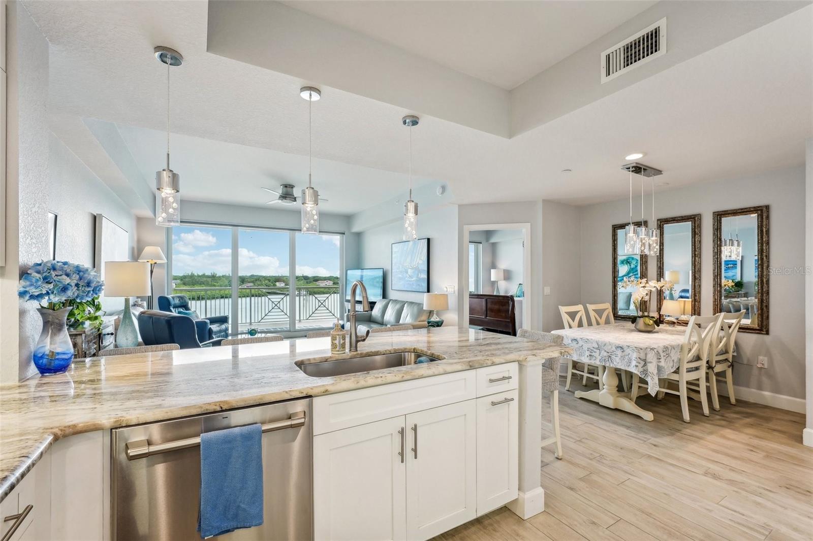 Unique to this unit is the dining area to the right, which was a customized request by the seller during construction.  Most Dolphin Key units have cabinets in this space.