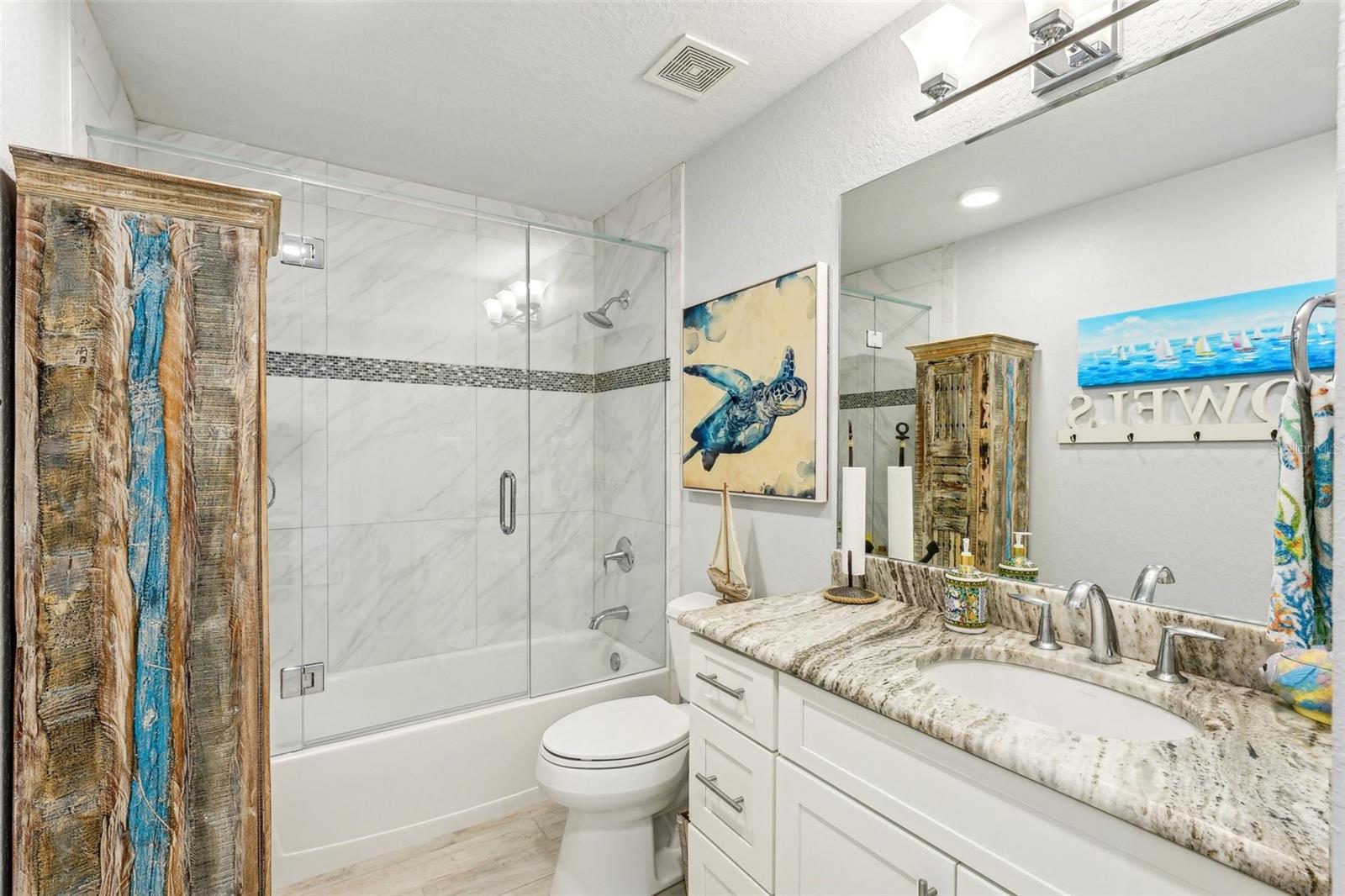 Bathroom 2 with tub and shower.