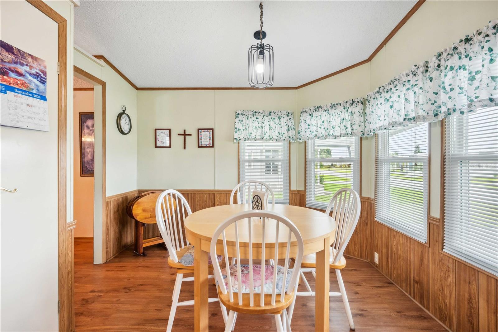 Main bedroom ceiling fan, three closets, fresh paint, and luxury vinyl plank flooring.,