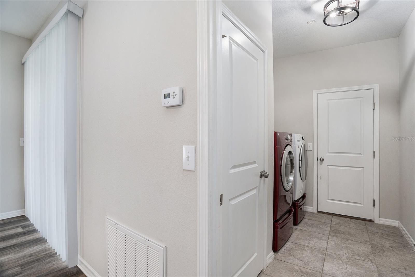 Laundry room leads to the garage