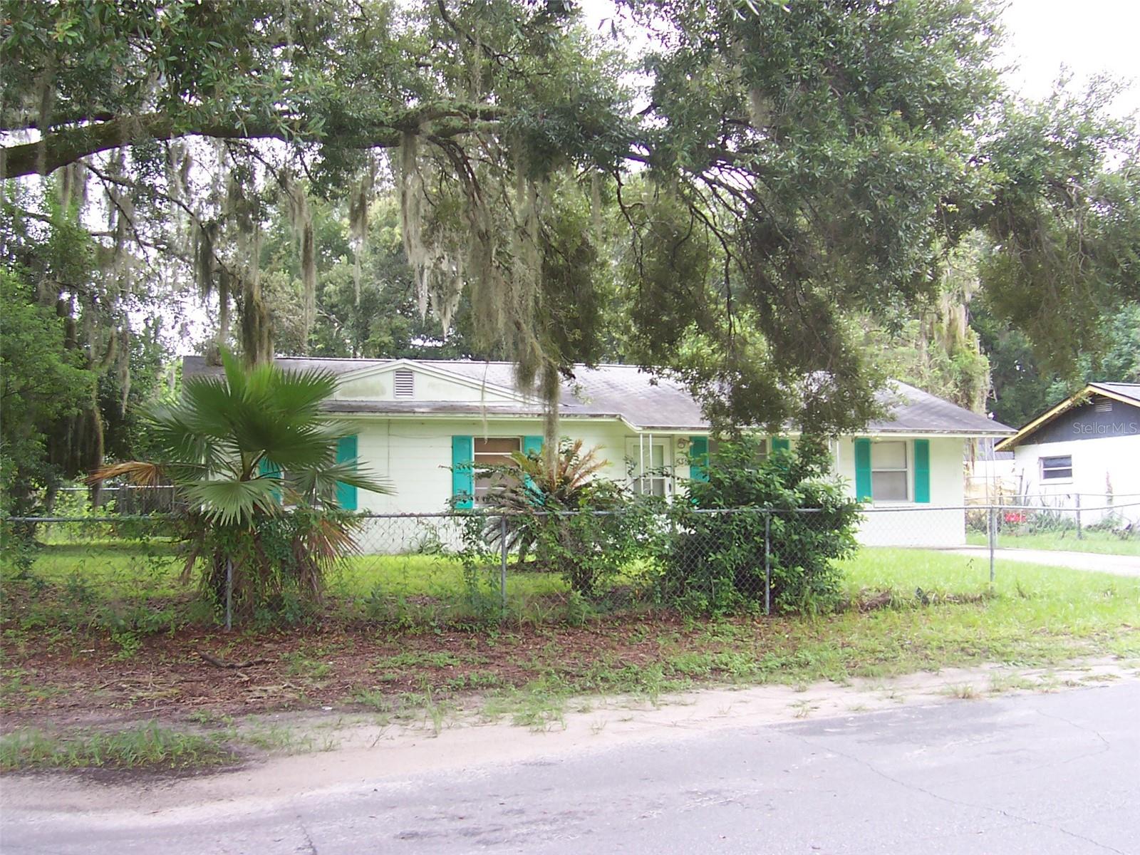 Fenced in Yard with mature landscaping.