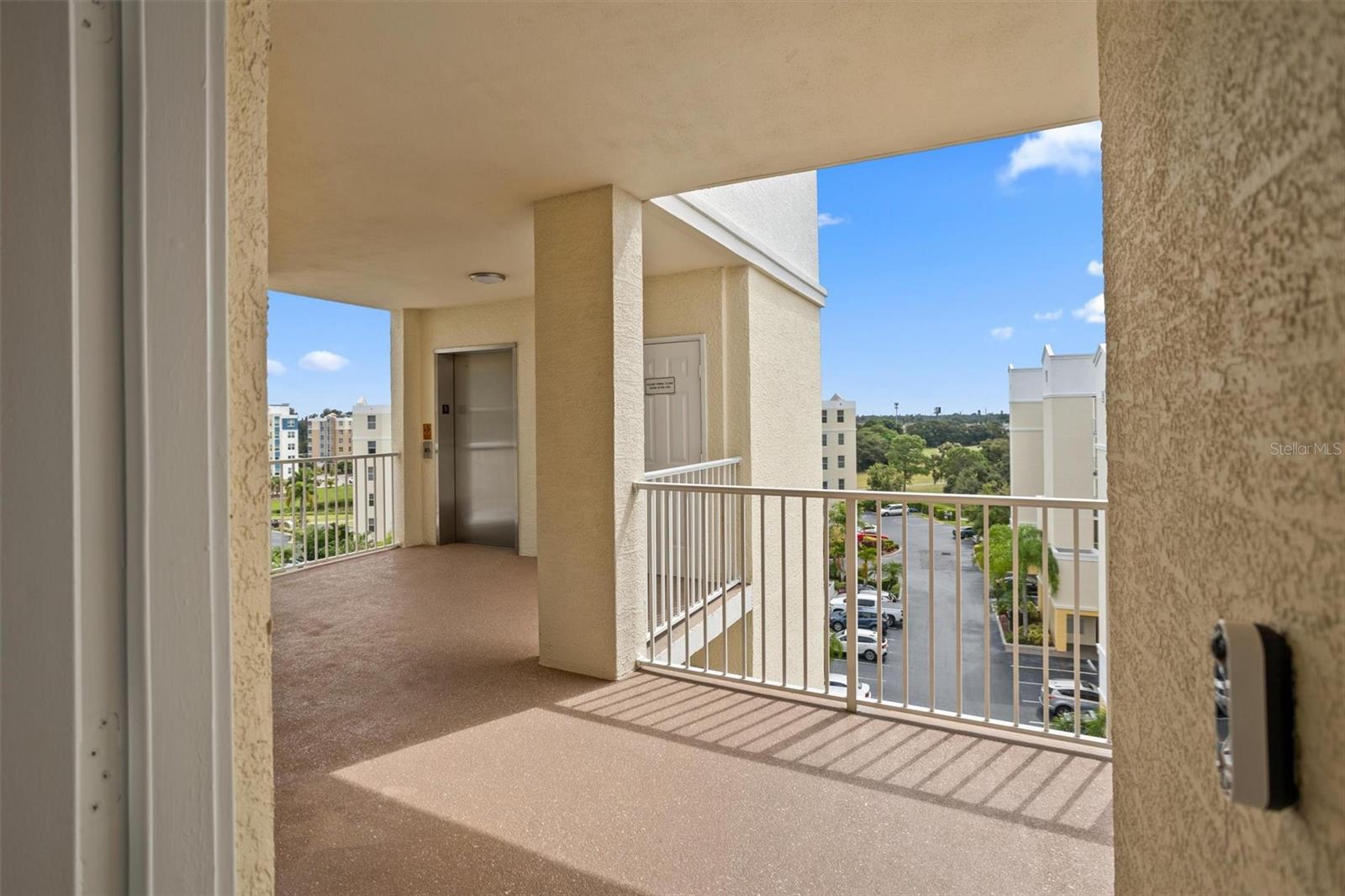 From front door; steps to elevator