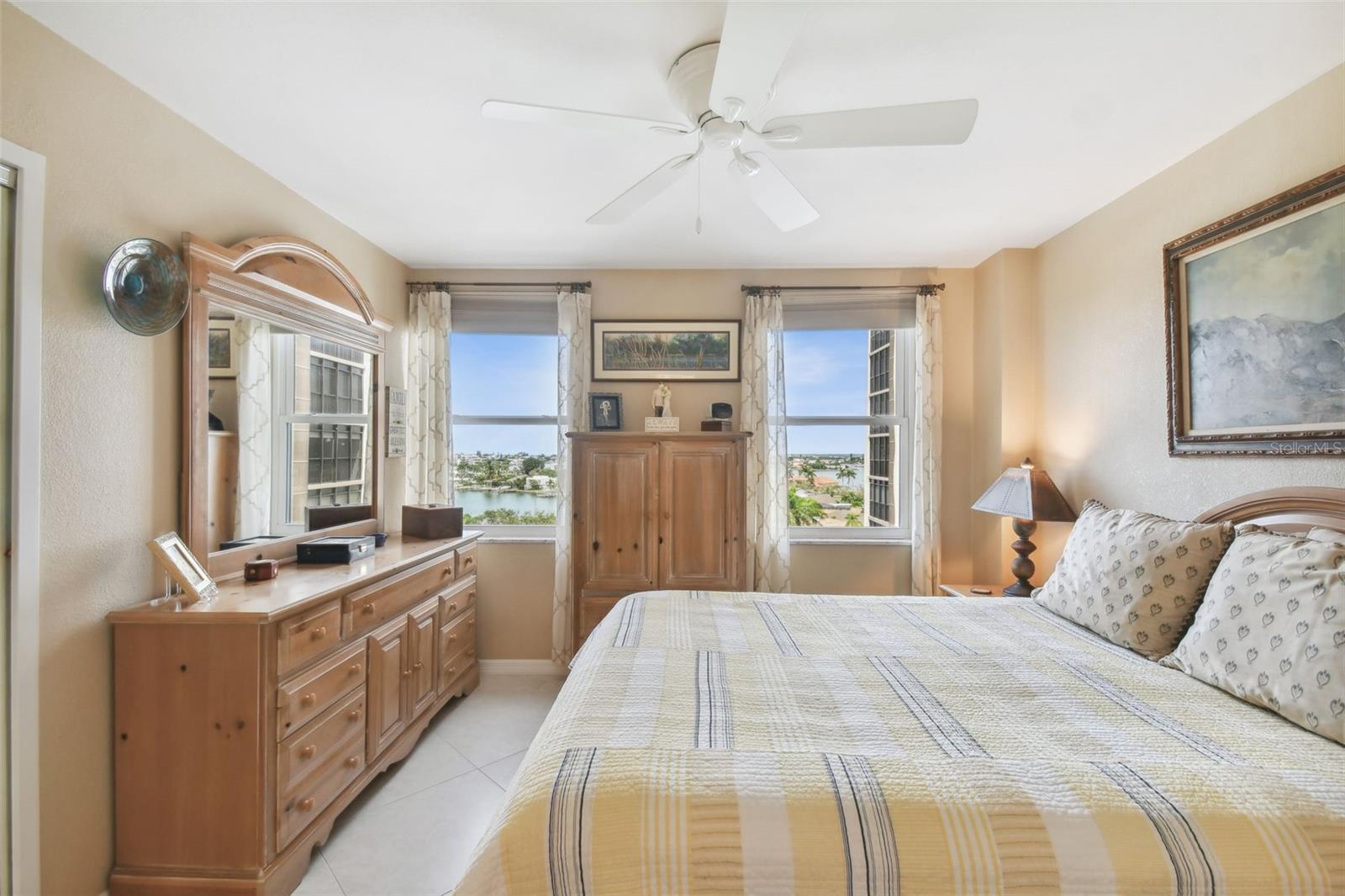 Wake up to water views from your spacious master bedroom