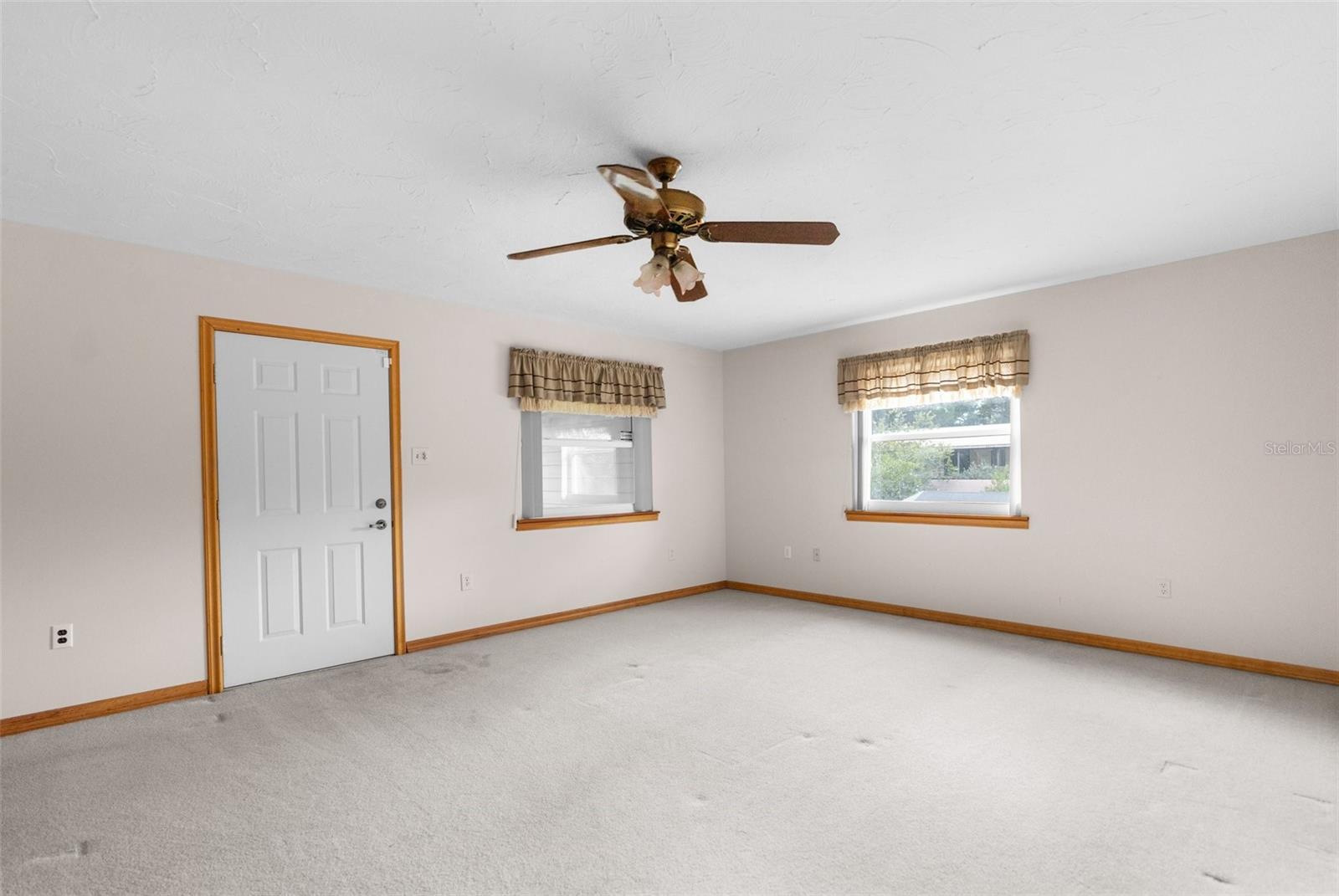 Main House bedroom with balcony access