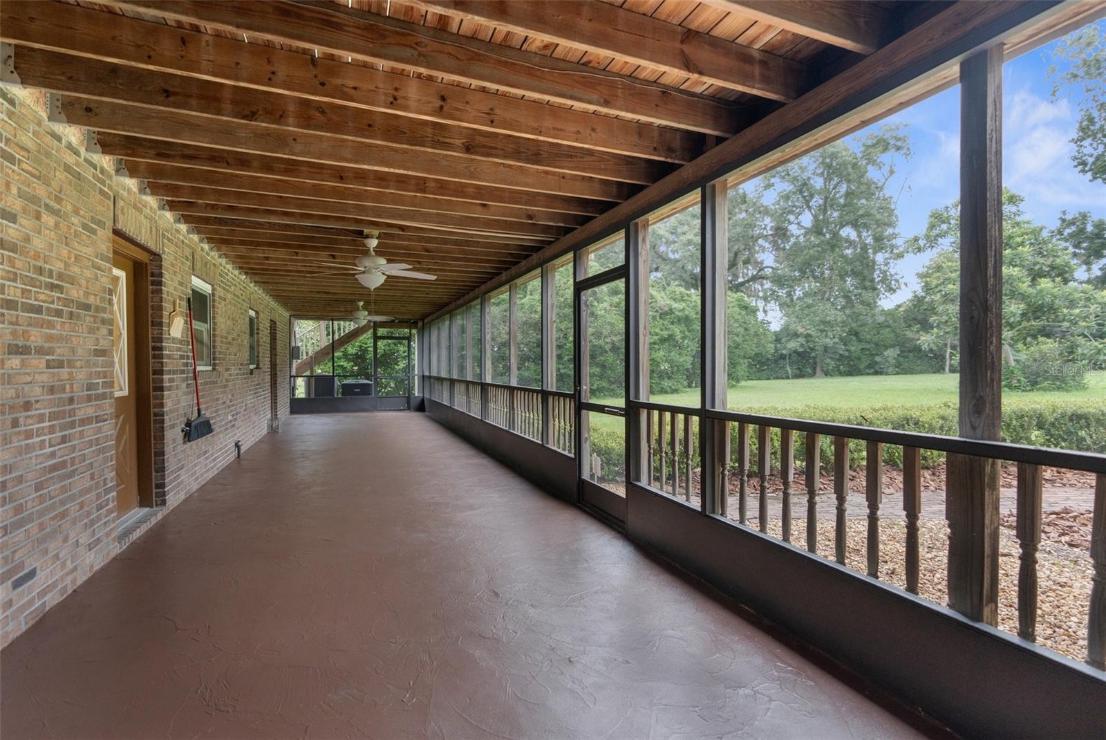 Downstairs screened in back patio/Florida room