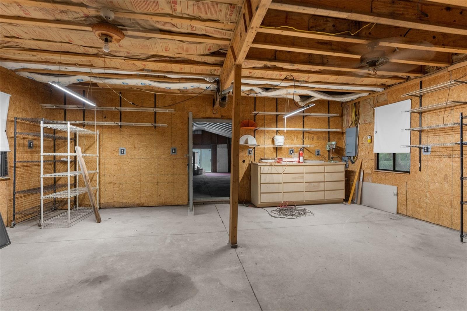 Indoor tool shed with lighting and electricity