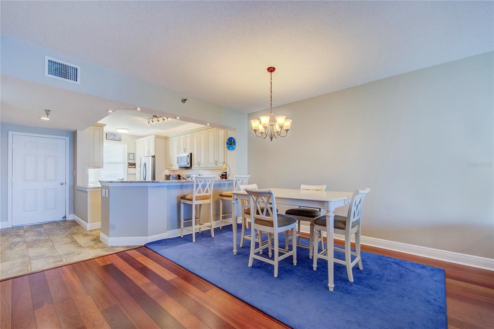 Dining area off kitchen with breakfast bar