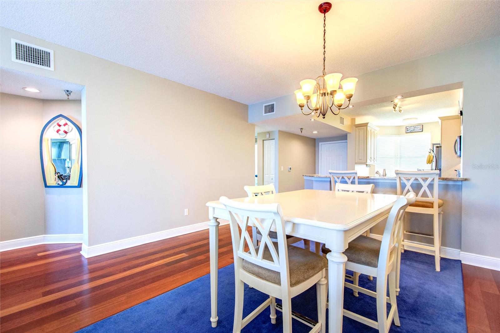 Rich wood flooring in living area