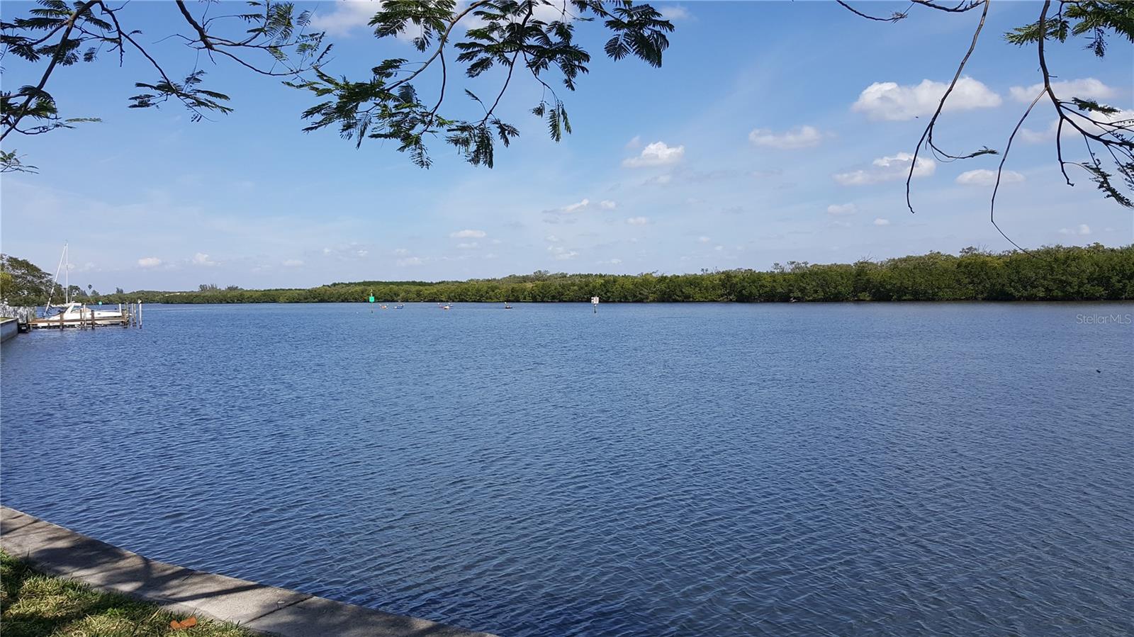 'No Bridges to the Bay' Canal from Larger Marina with High and Dry Storage