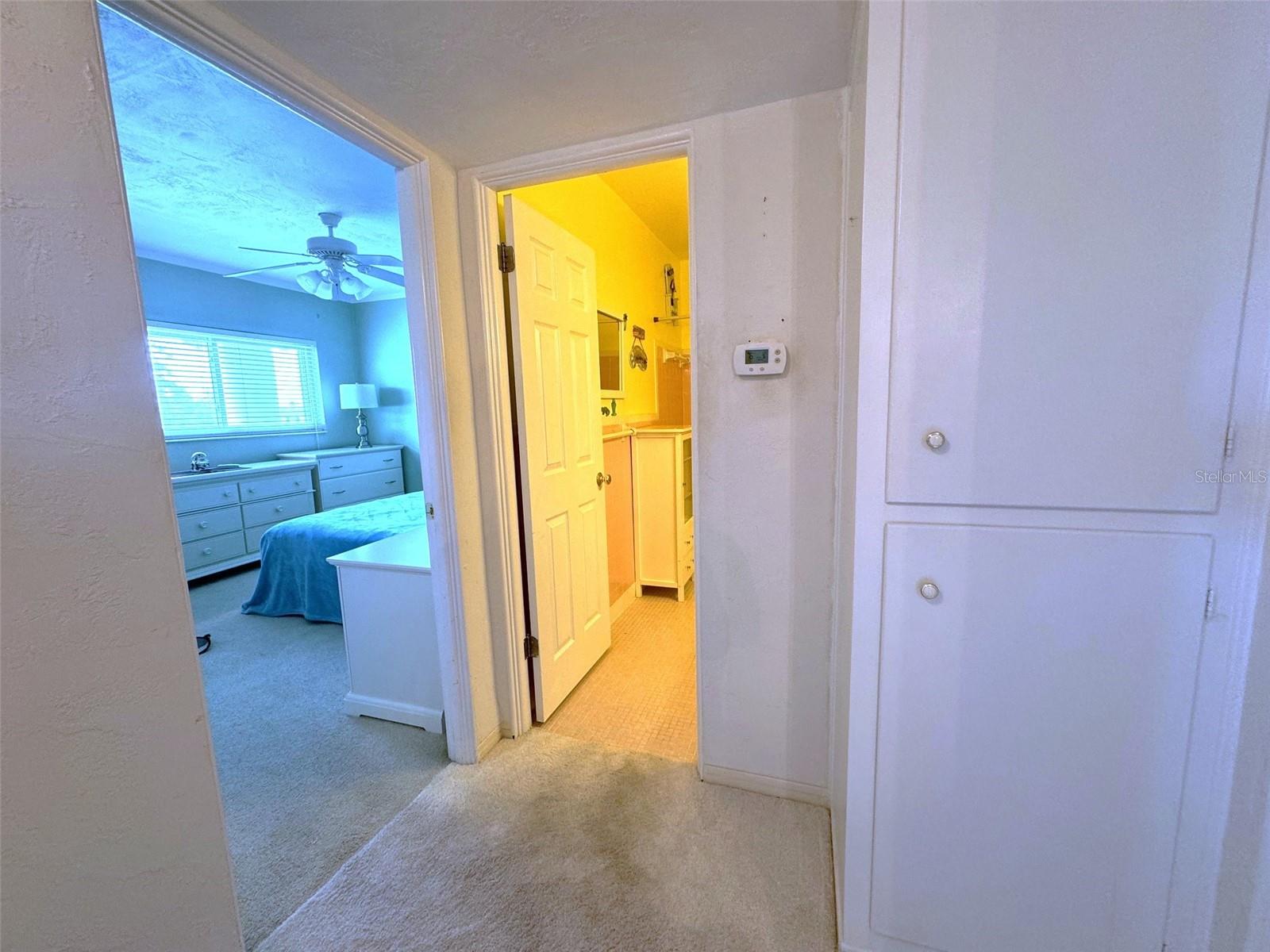 Hallway with extra linen closet