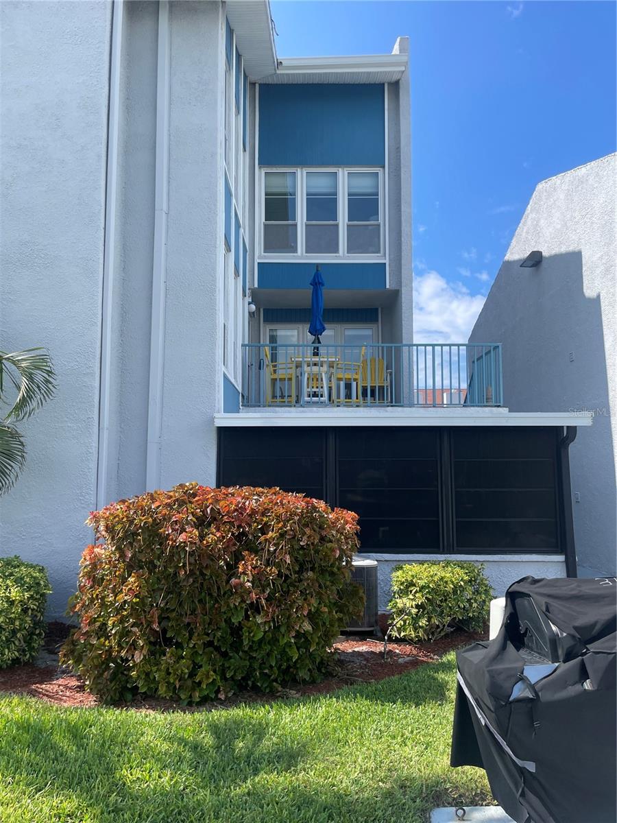 View of condo from grilling area