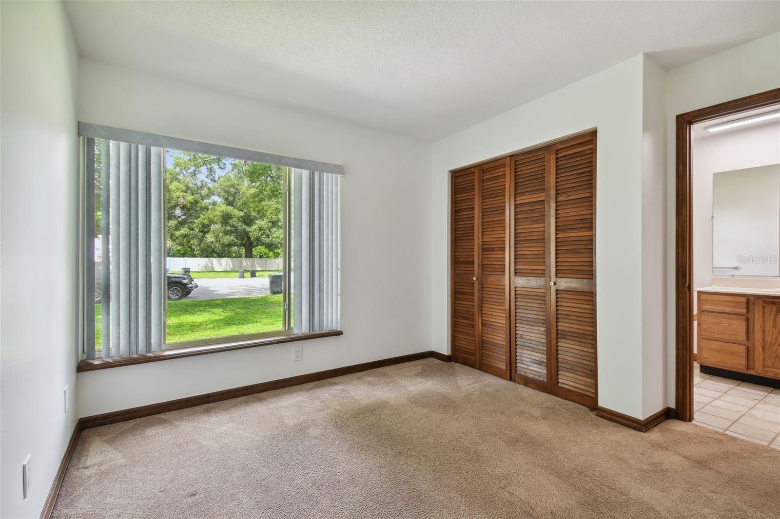 Your bedroom and flex space has an adjoining door to the owner's bathroom.