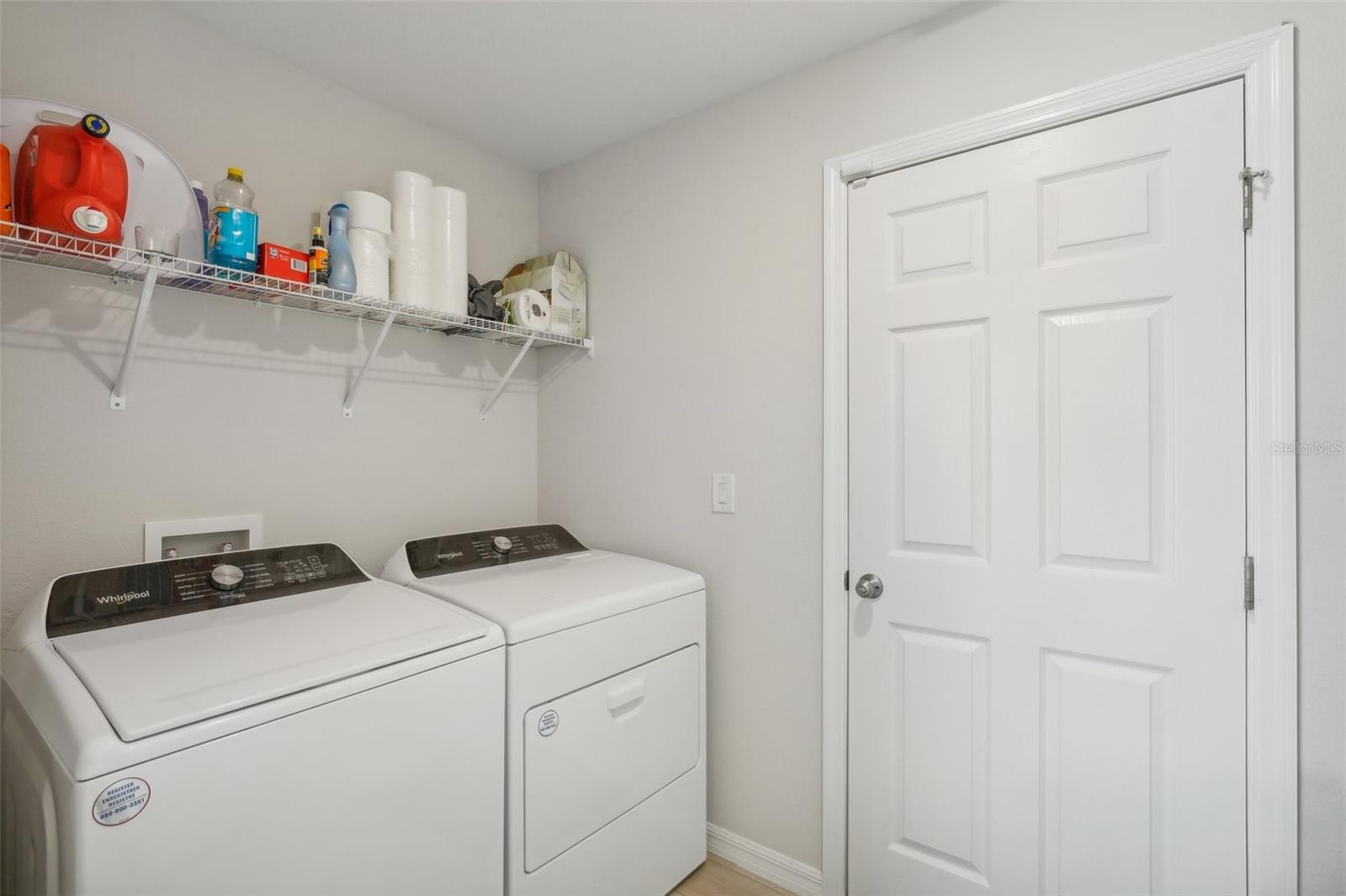 Laundry room located off the garage