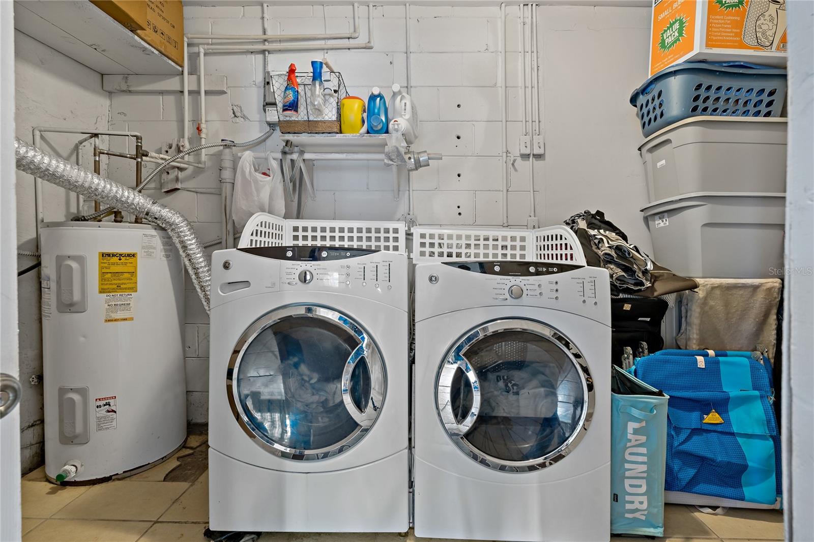 Walk in laundry room with storage space!