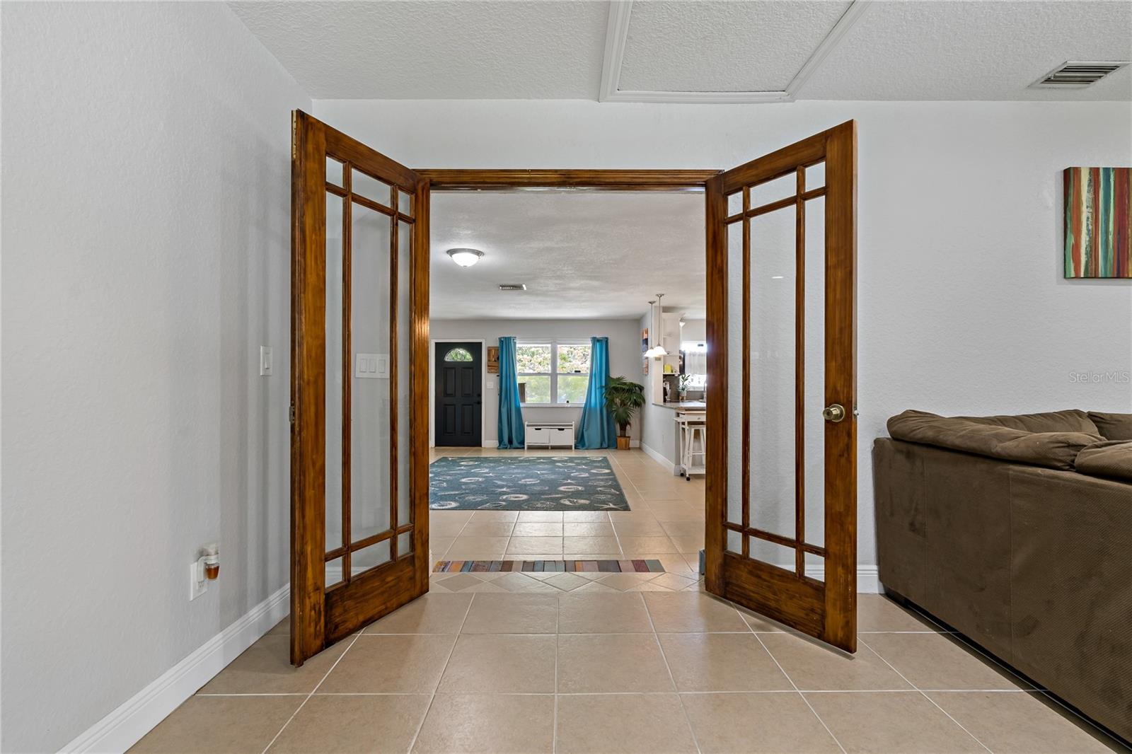 French doors into the 2nd living room/bonus room.