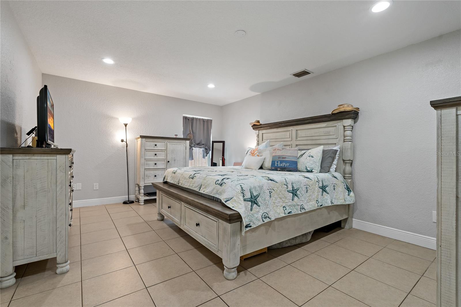 Spacious and private master bedroom with ensuite bathroom.