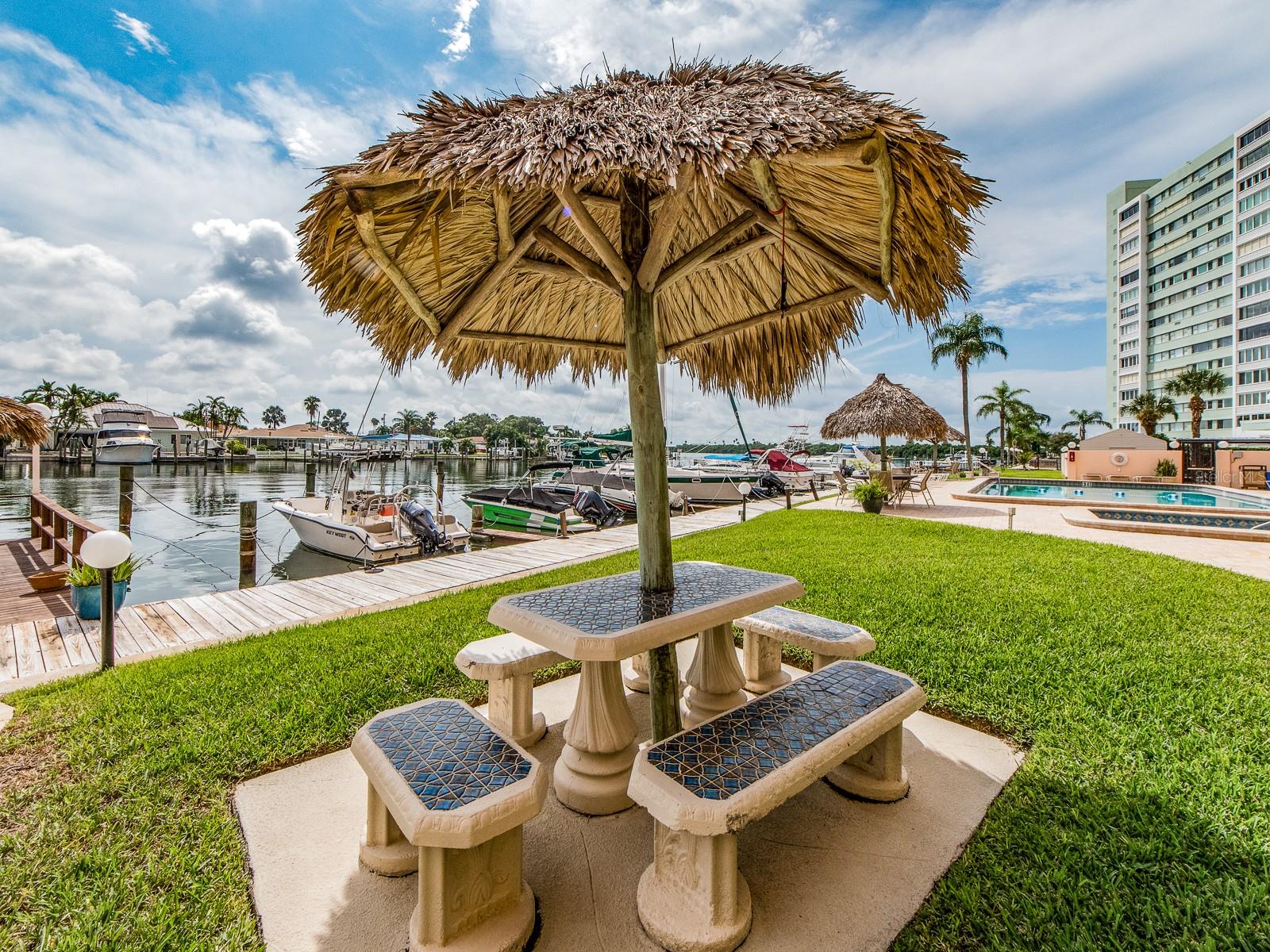 Tiki picnic area by water