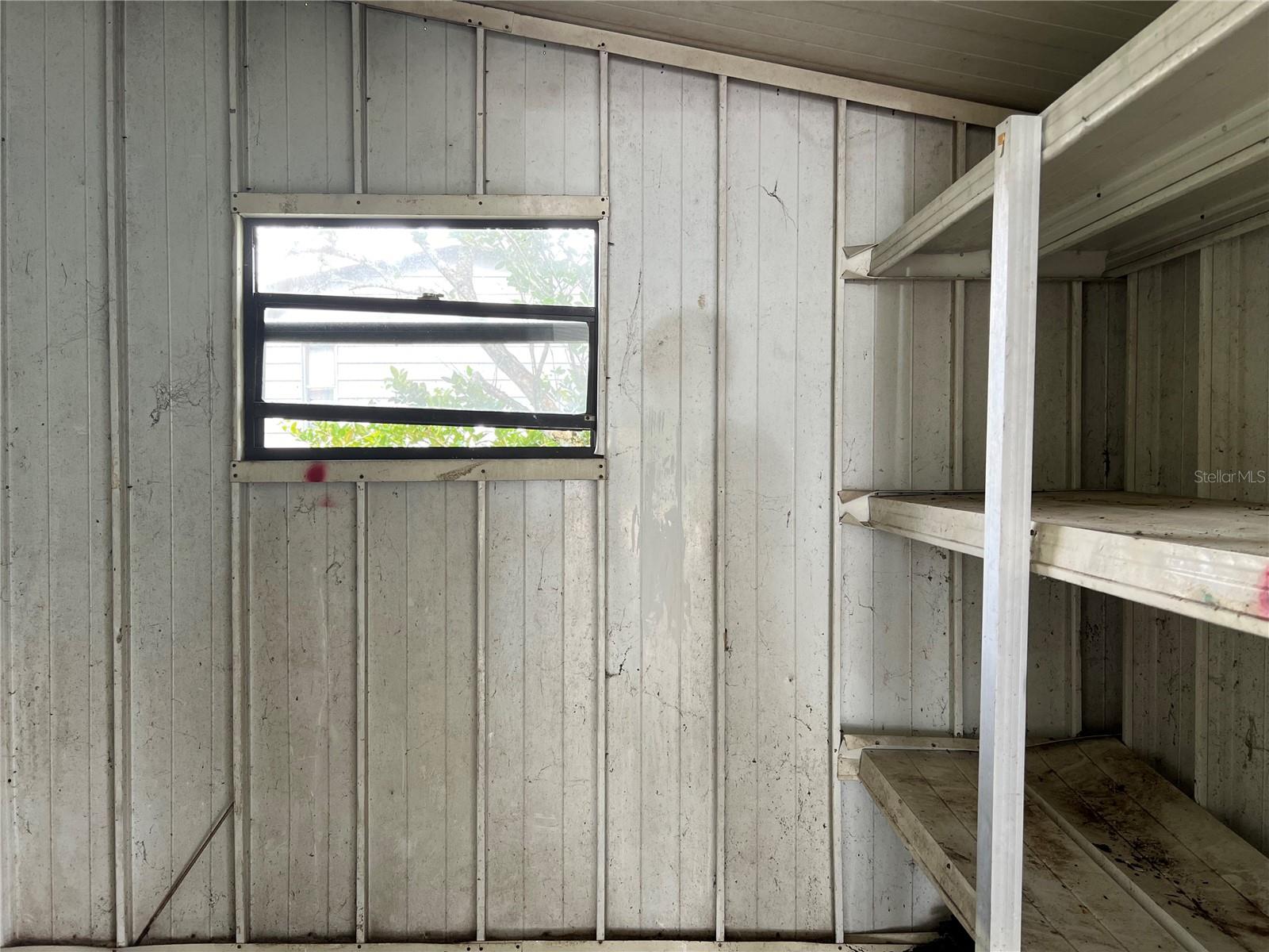 Storage Room at the end of the carport. Can be updated into a home office, craft room, etc. Has electrical power.