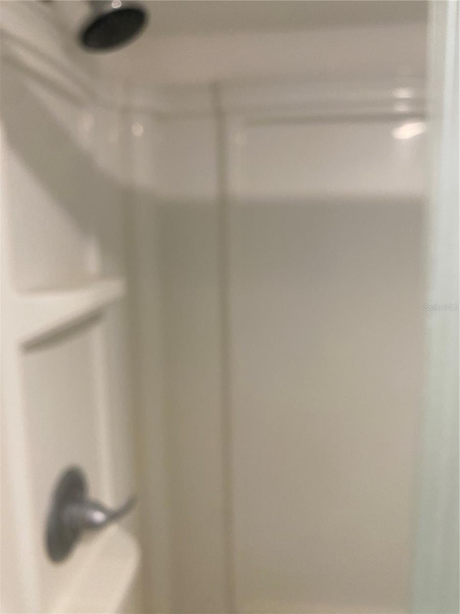 shower 6 years old vinyl all around with newer plumbing