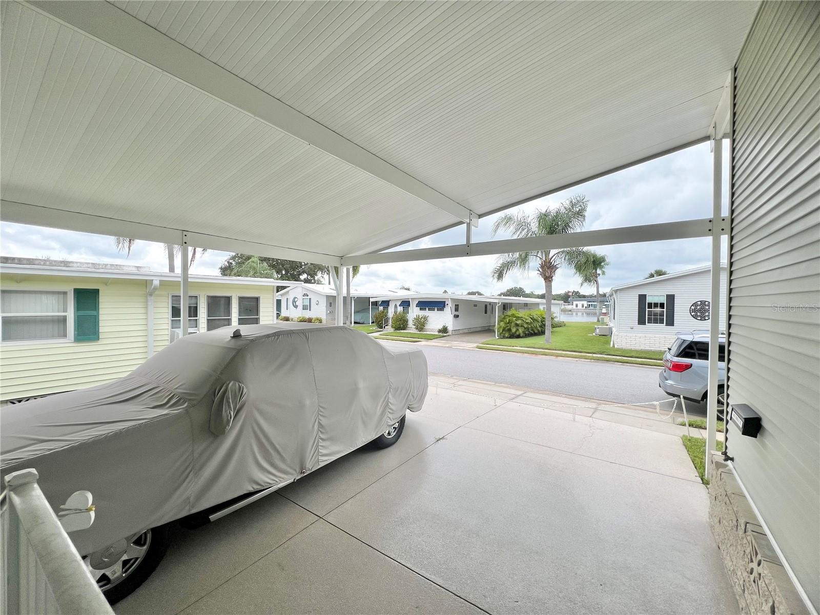 large extended carport for 2 cars side by side