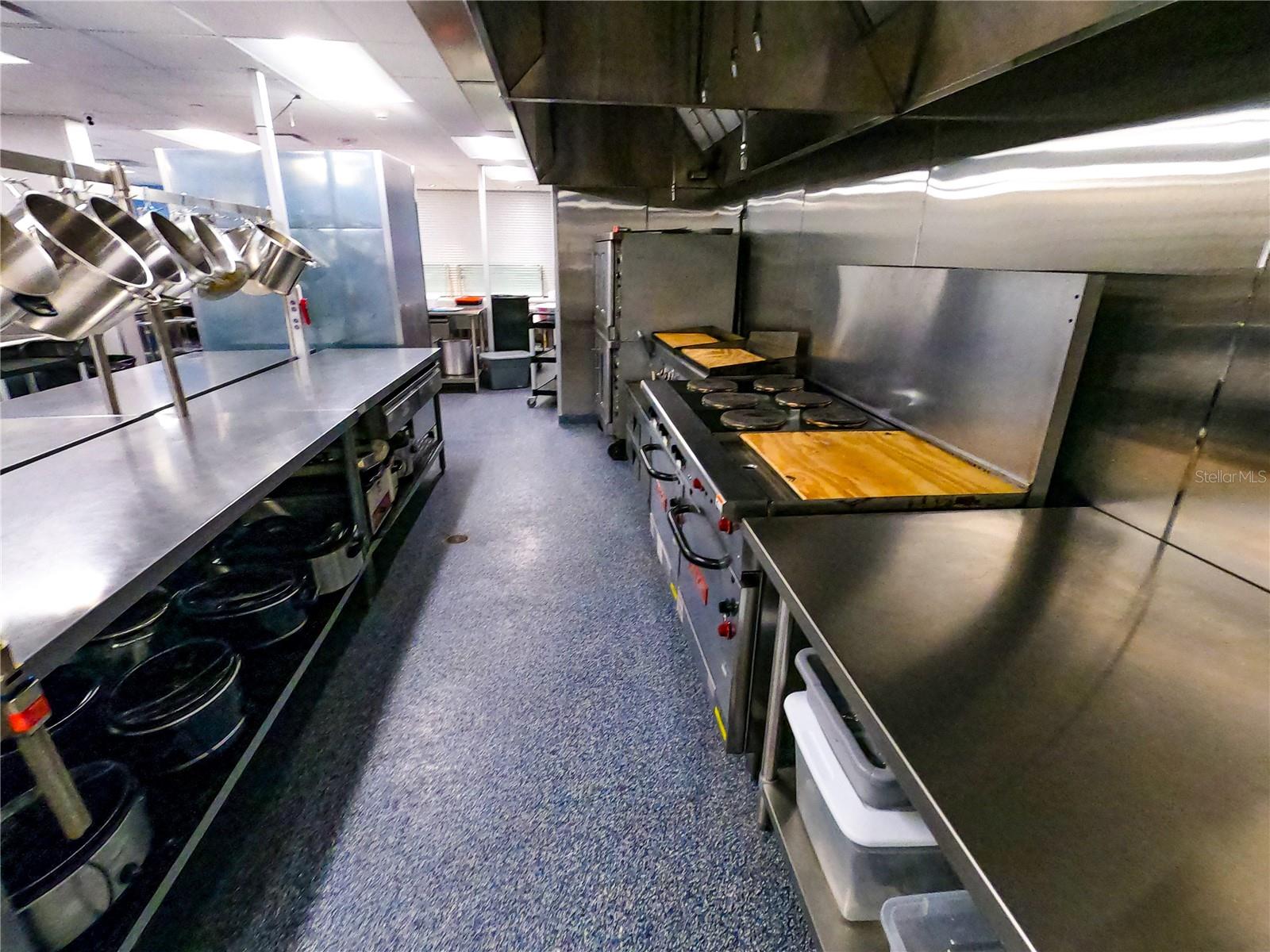 Industrial style kitchen in clubhouse