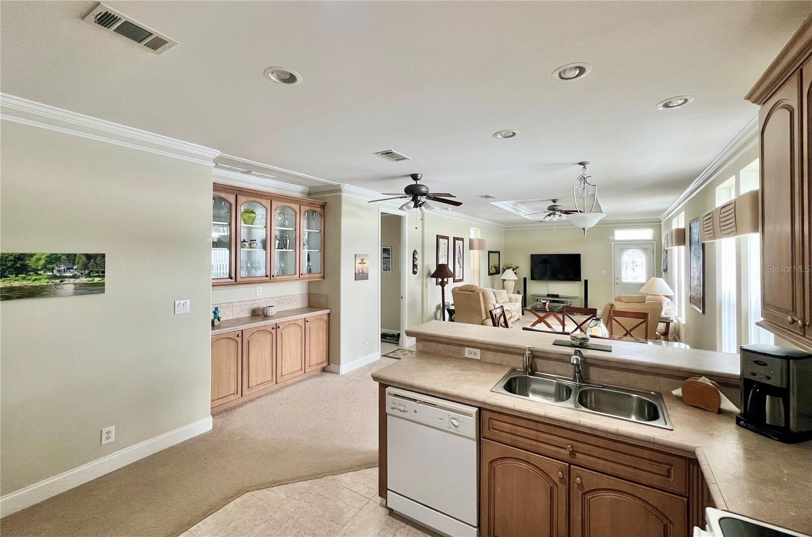 Kitchen through to the built in dry bar/dining room