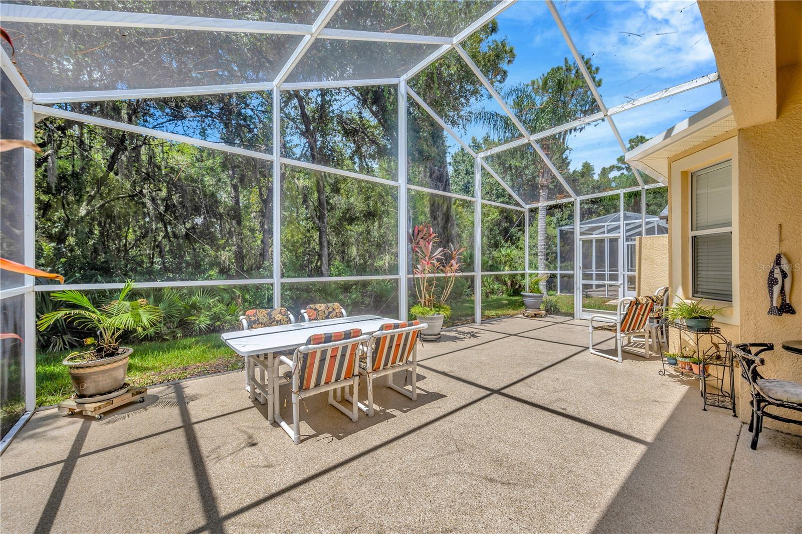 Oversized back lanai with privacy and plenty of wildlife.