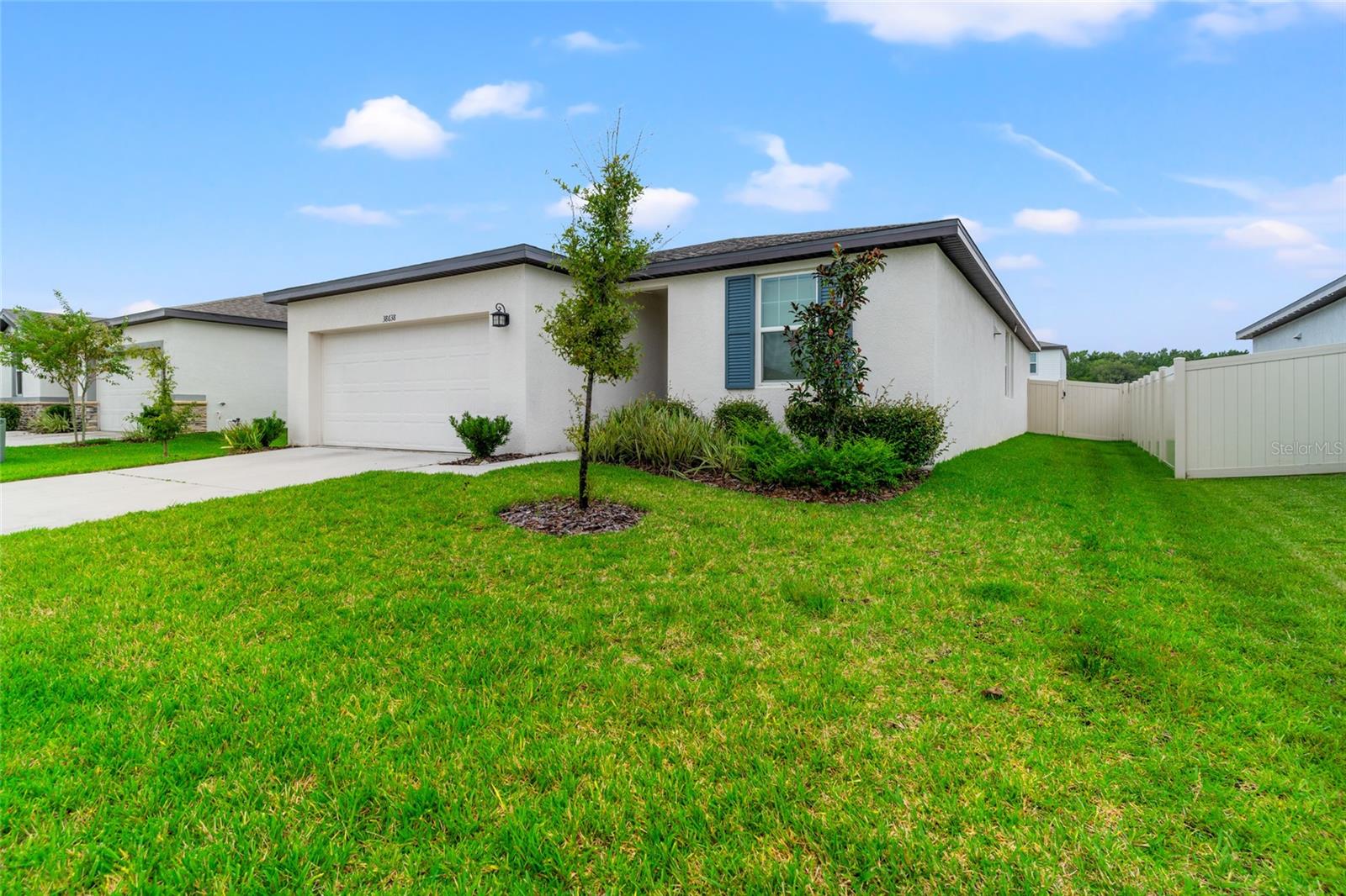 Nice Landscaping and Fenced Yard