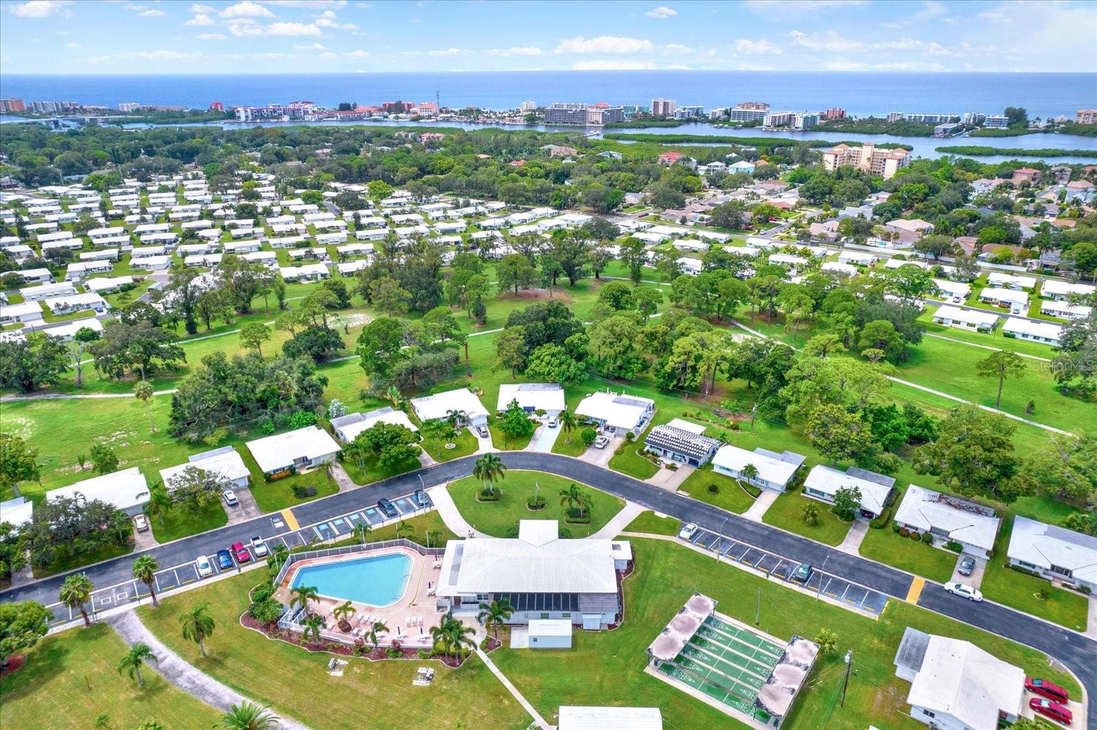 Pool, clubhouse, and shuffleboard