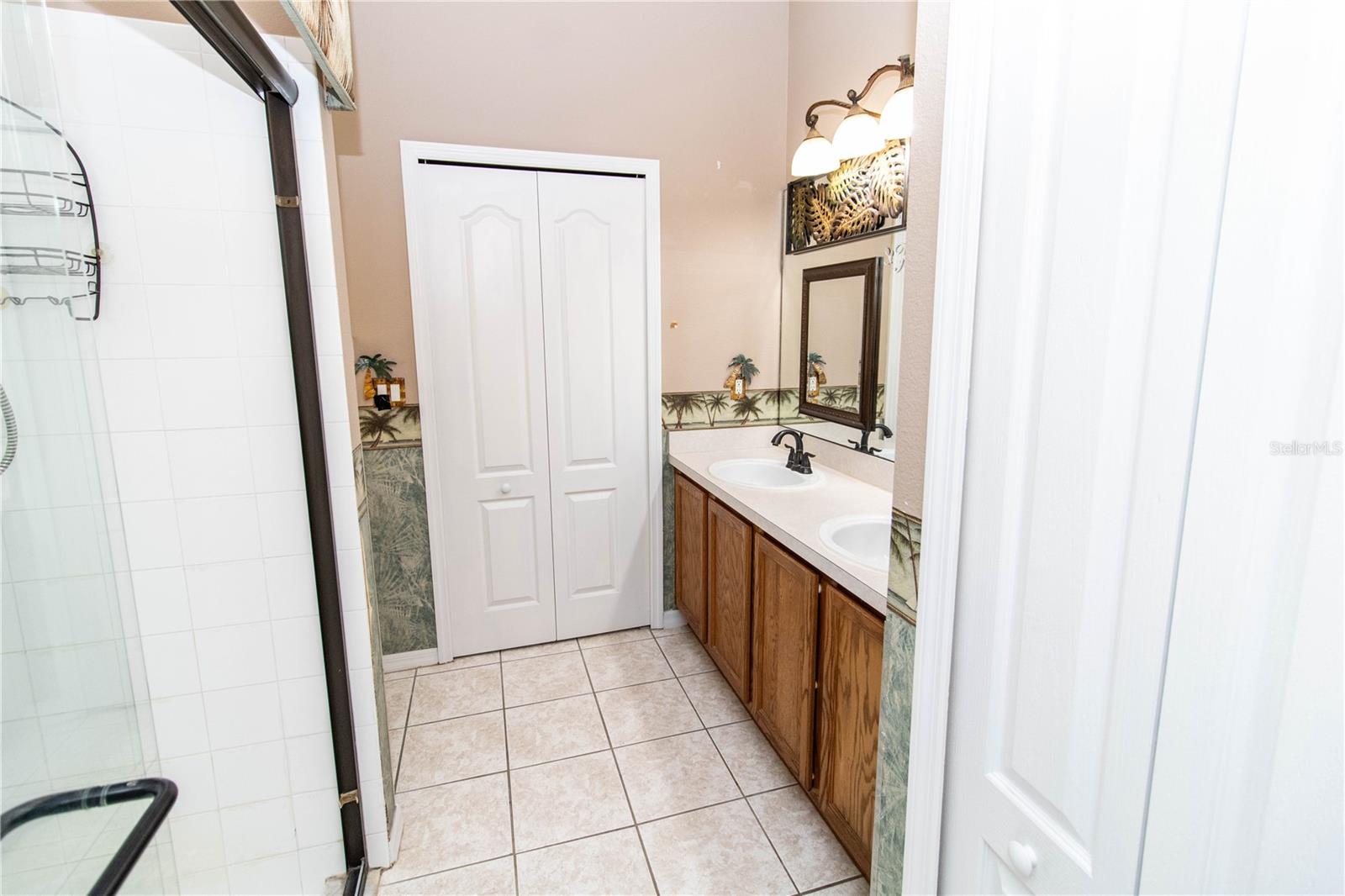 Primary Bath with Dual Sinks, Walk-In Shower, & Walk-In Closet