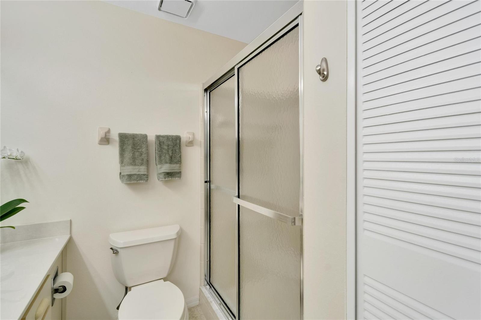 Primary bath with a large linen closet