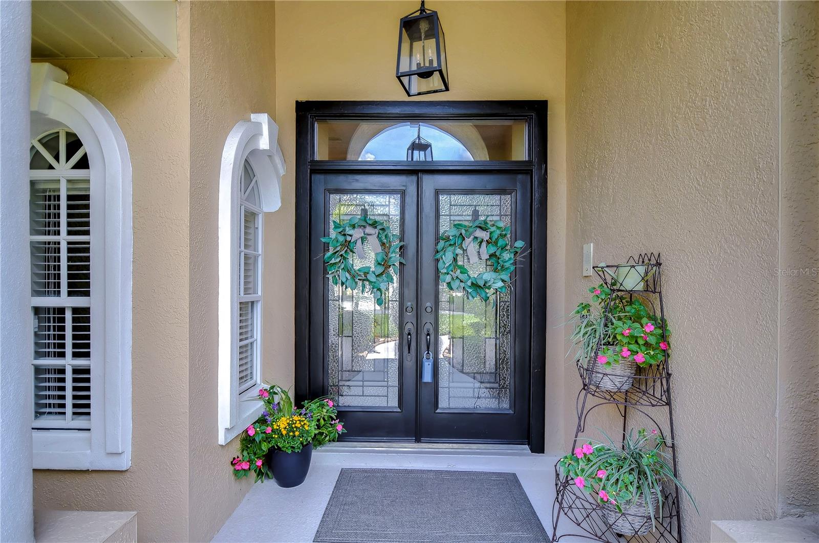 Leaded, glass front doors welcome you in!