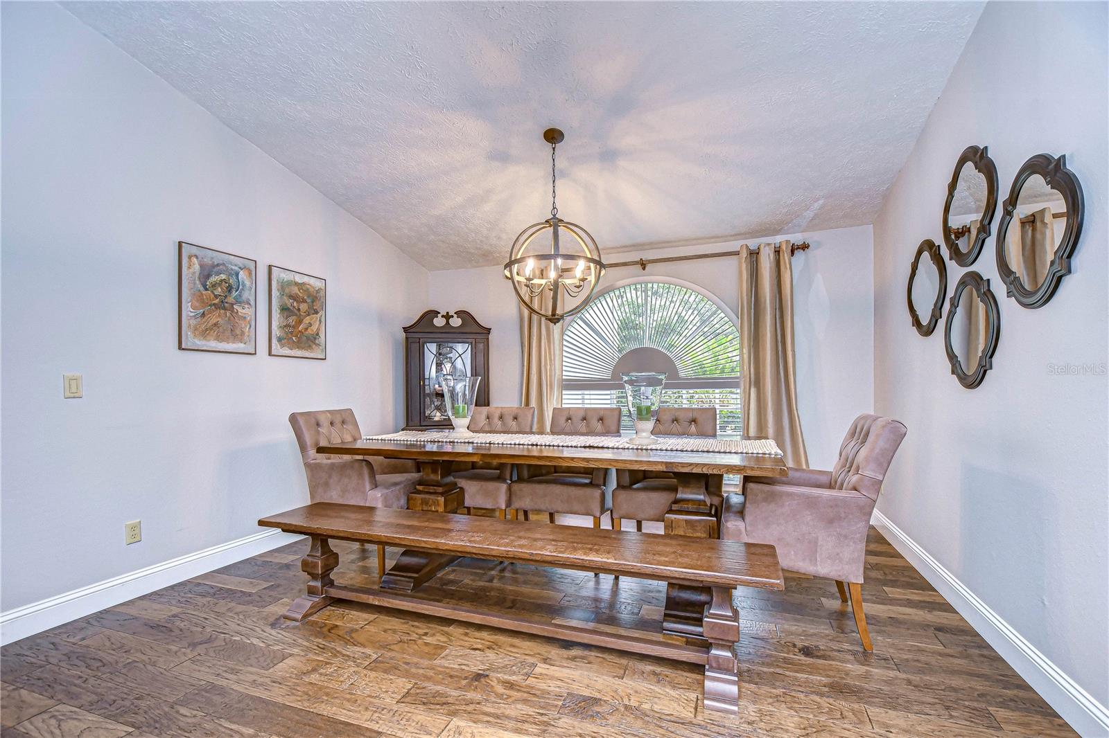 Formal dining room with vaulted ceiling is the perfect spot to entertain!